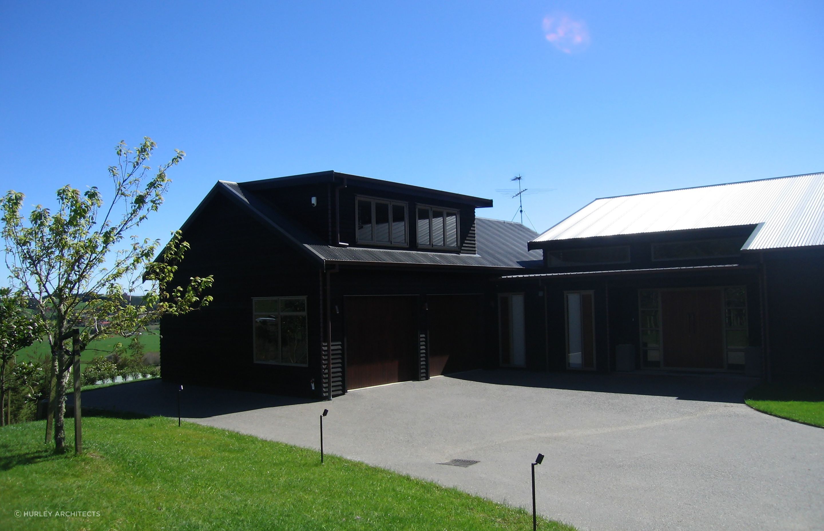 An attic space above the garage faces the northern sunny aspect.