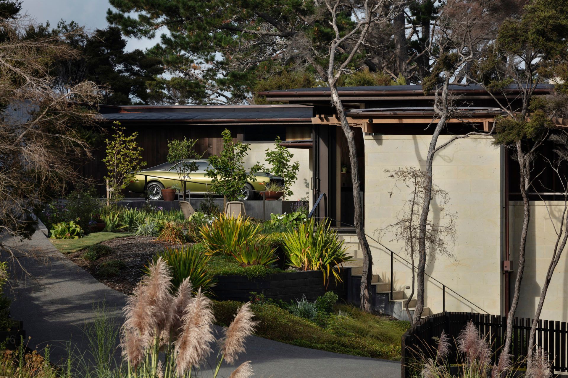 Set within regenerating bush, The Knoll is a stunning example of Kiwi modernism – inspired by Frank Lloyd Wright's Usonian houses with a rational plan and a richly crafted interior.