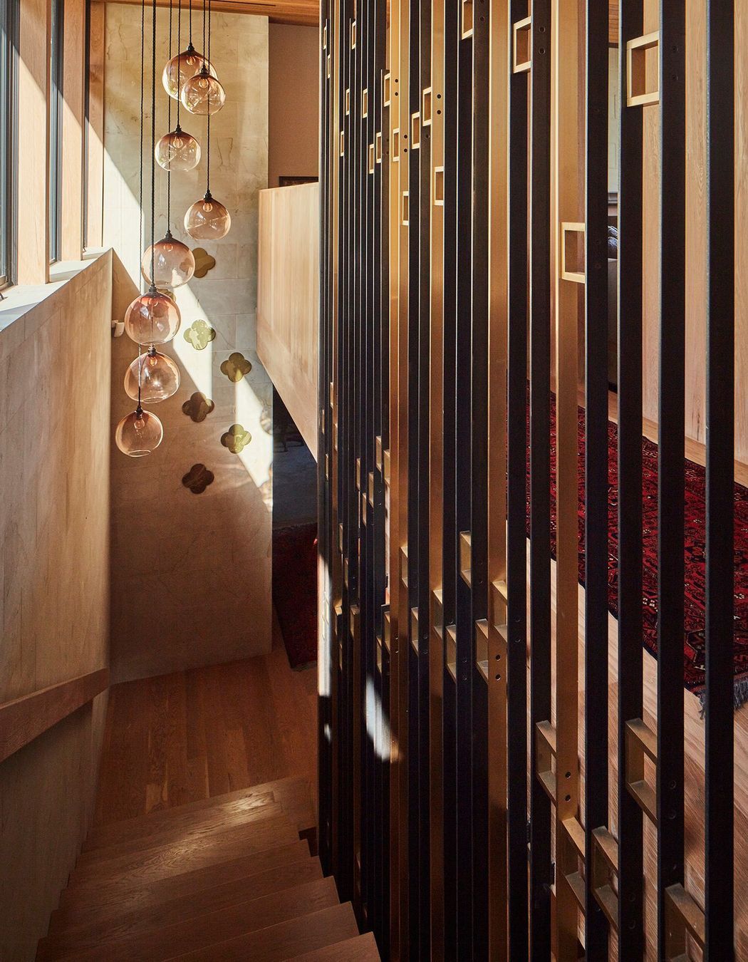 Looking down the feature staircase from the upper to lower levels.