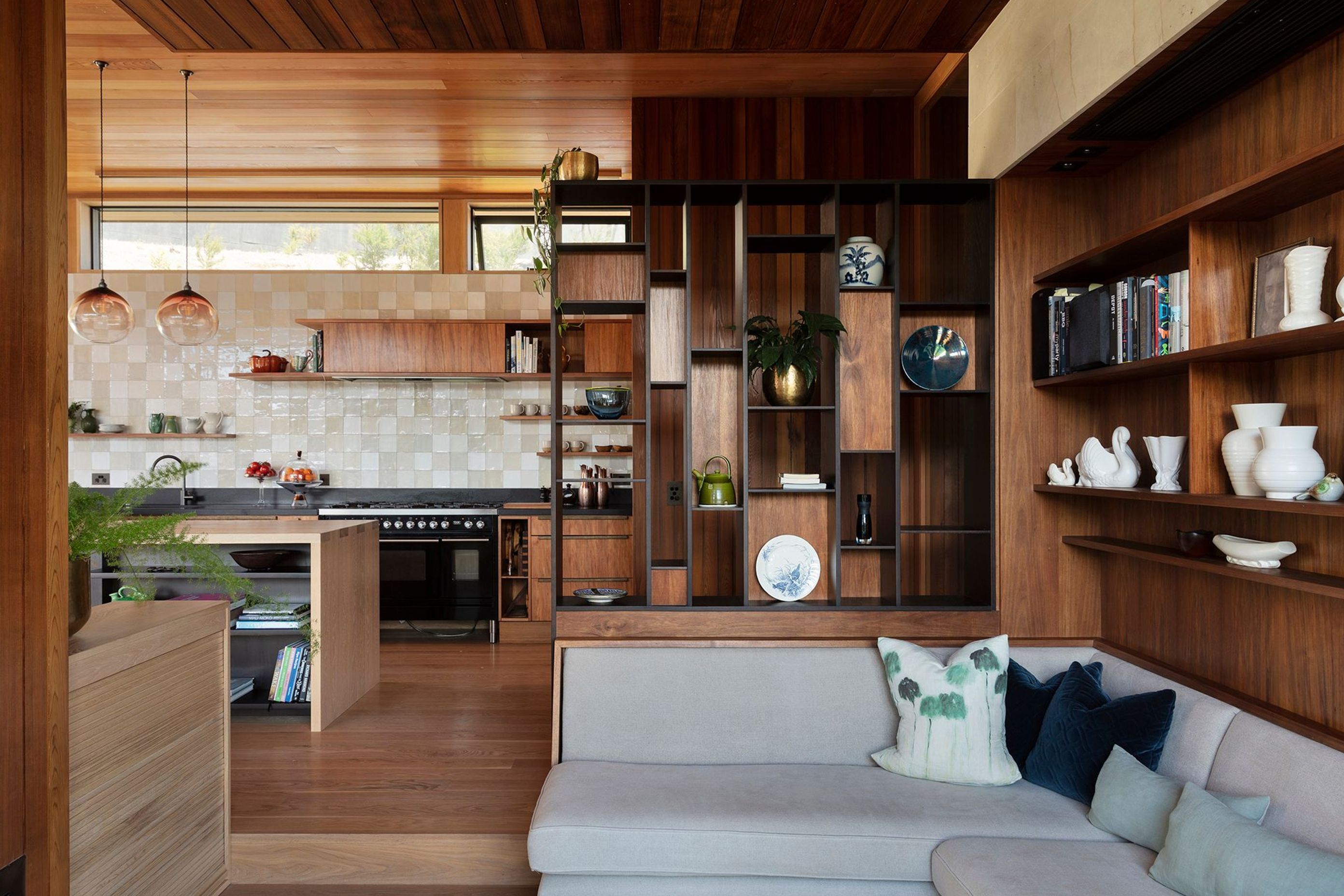 The kitchen and snug feature built-in timber cabinetry. The kitchen tiles were inspired by the artist Rembrant's own kitchen in his home in Amsterdam.