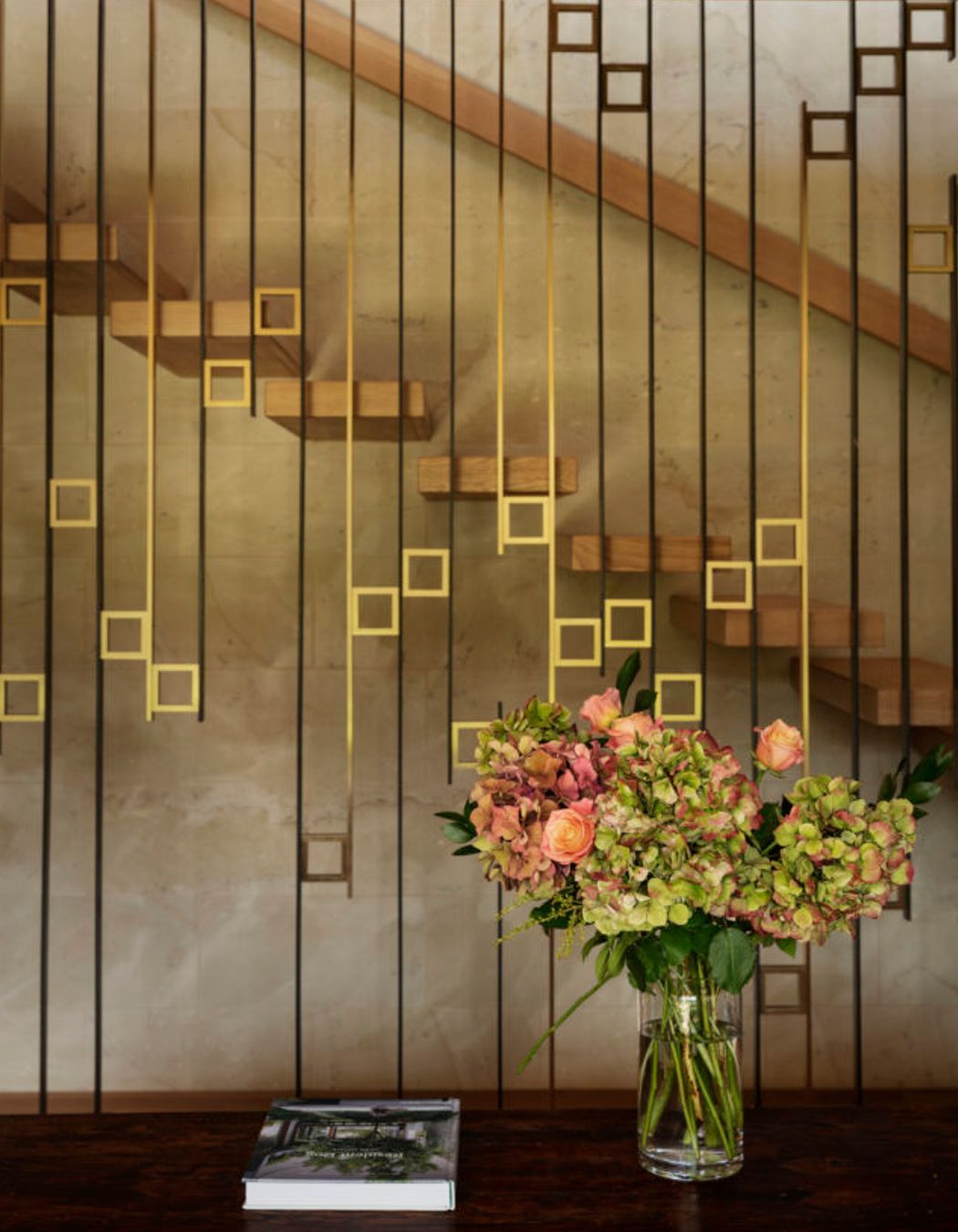 The beautiful staircase screen was designed by Edwards and crafted by Powersurge.