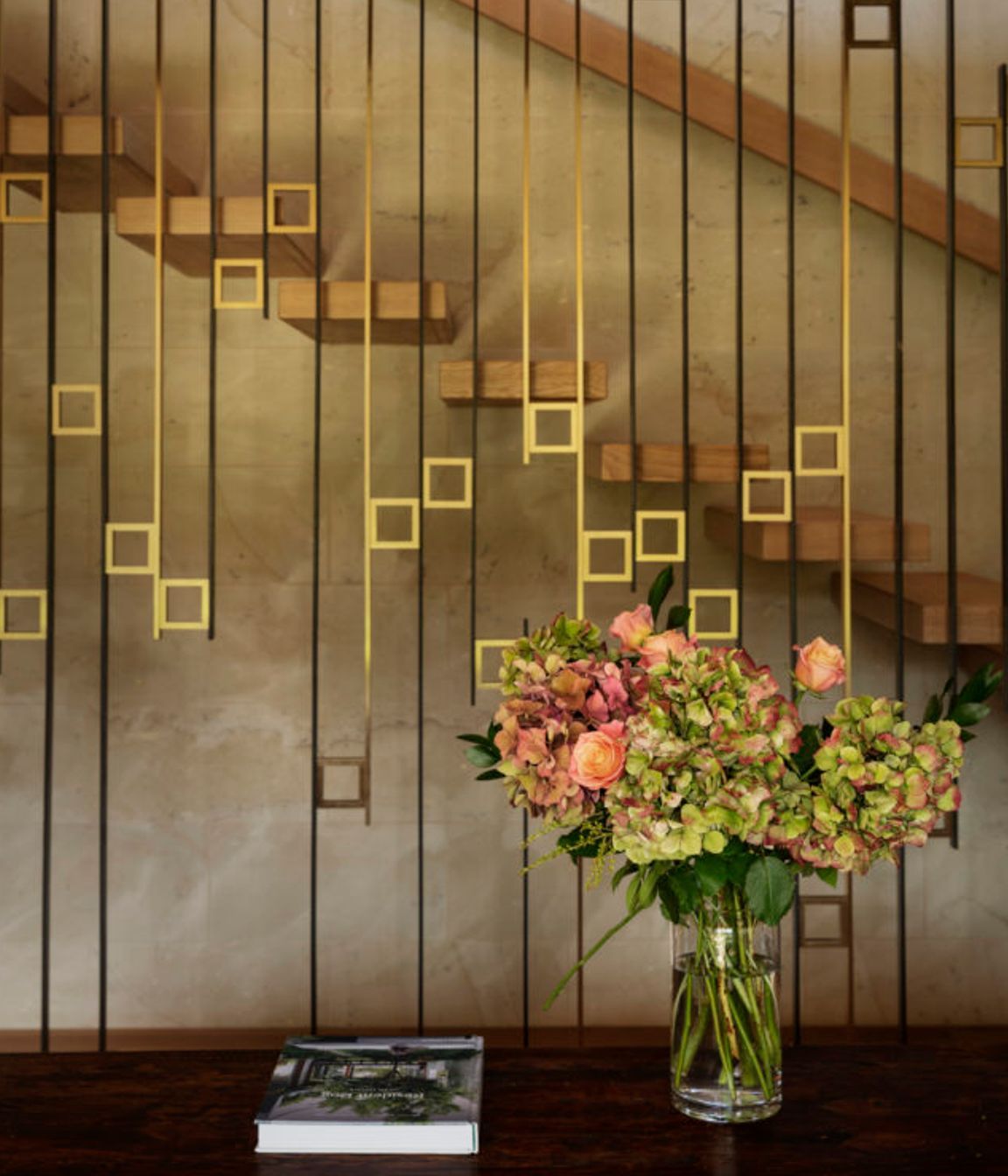 The beautiful staircase screen was designed by Edwards and crafted by Powersurge.