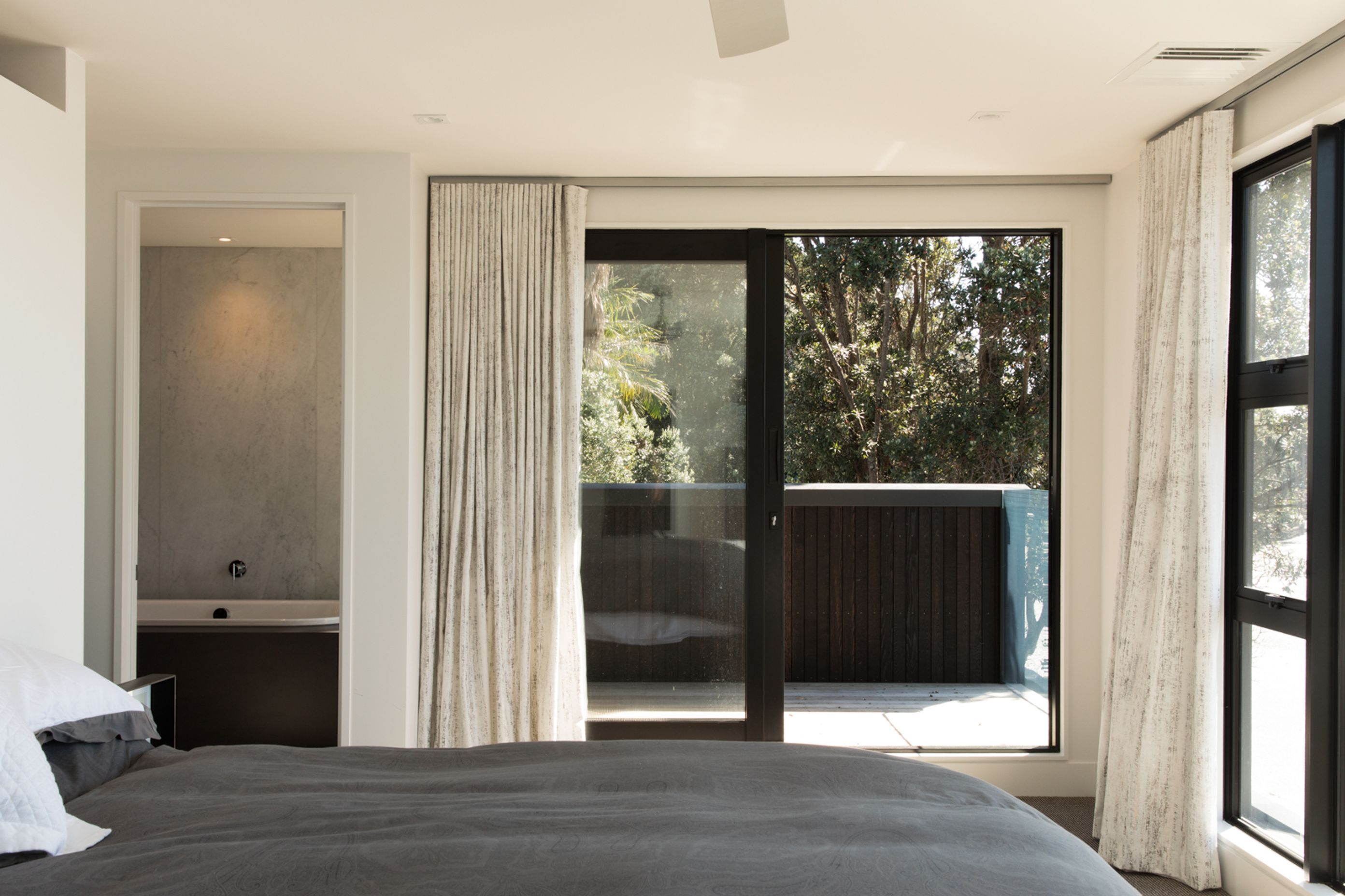 The master bedroom and en suite bathroom.