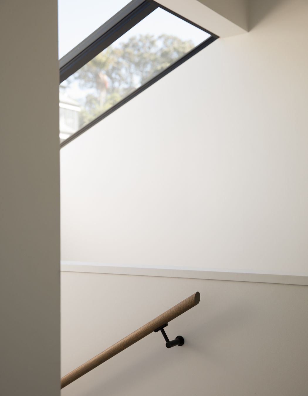 A new skylight fills the stairwell with light.