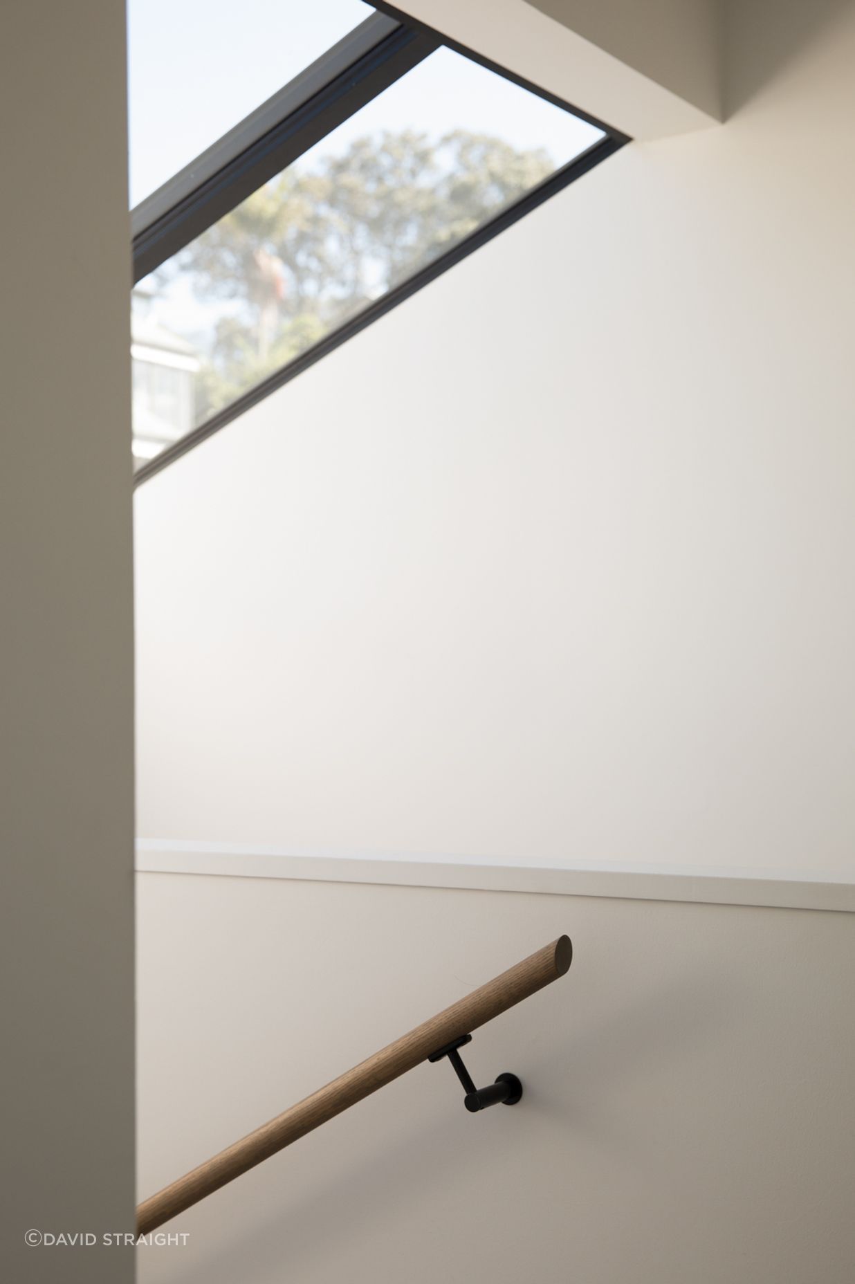 A new skylight fills the stairwell with light.