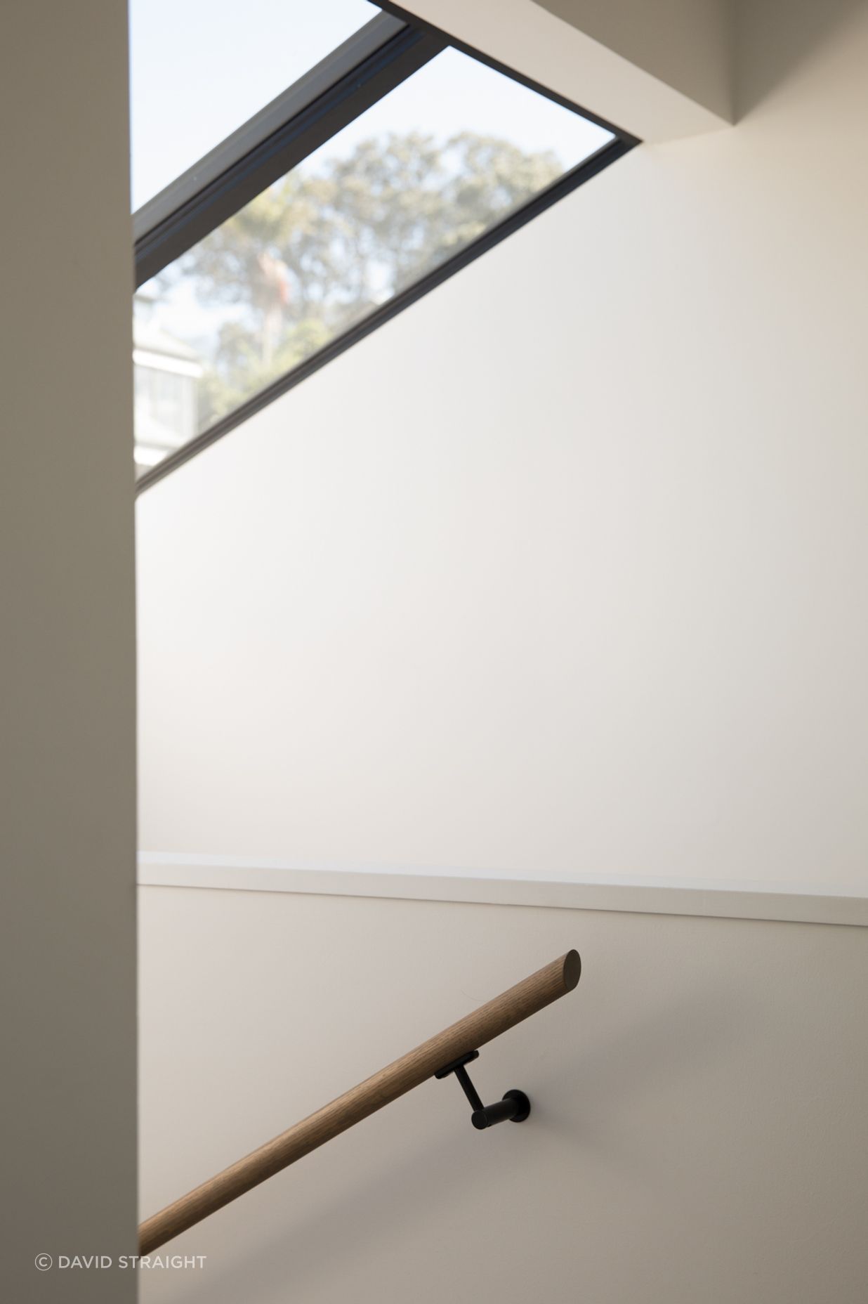 A new skylight fills the stairwell with light.