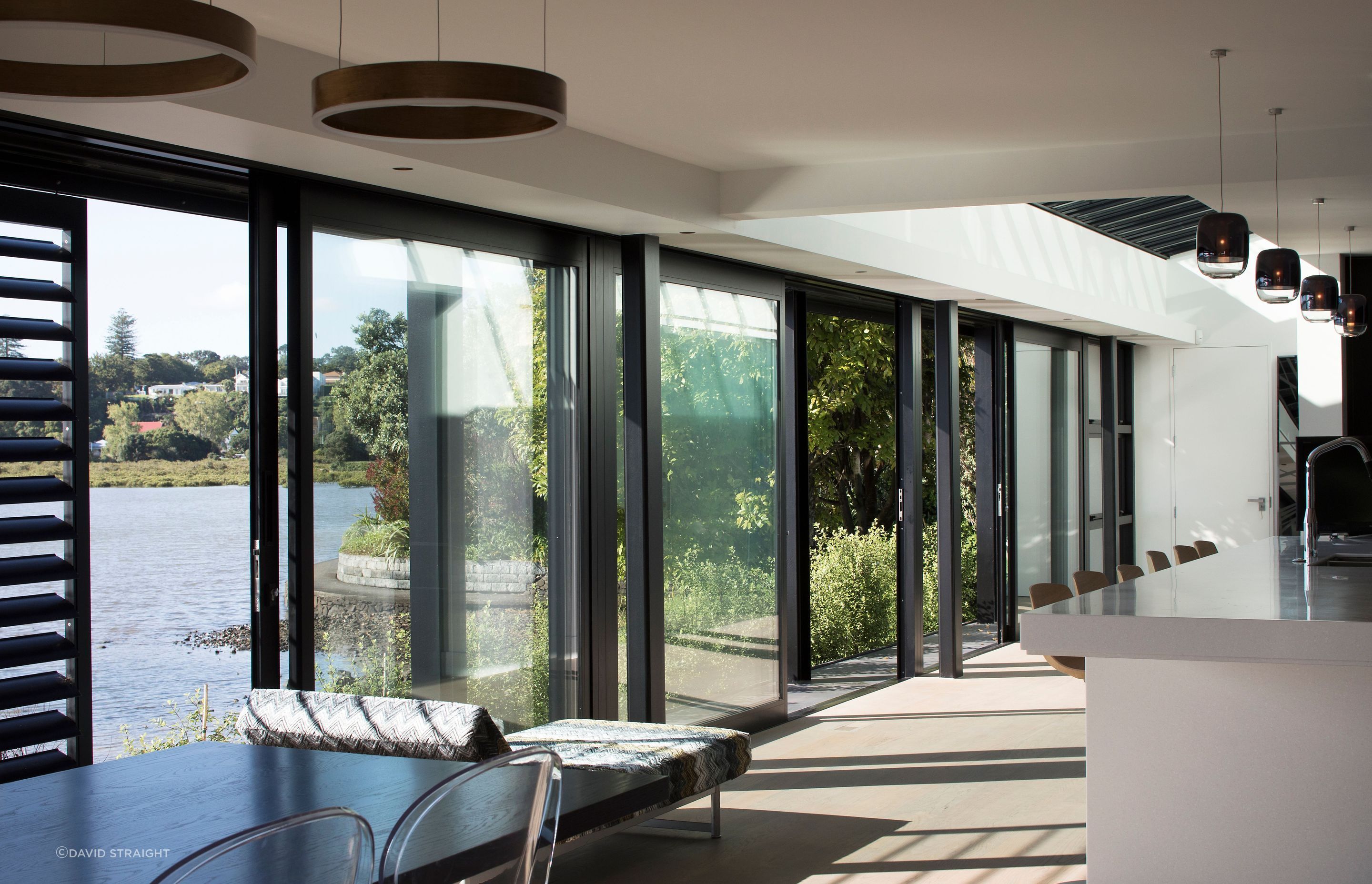 At high tide, the kitchen and dining area sits right beside the water.