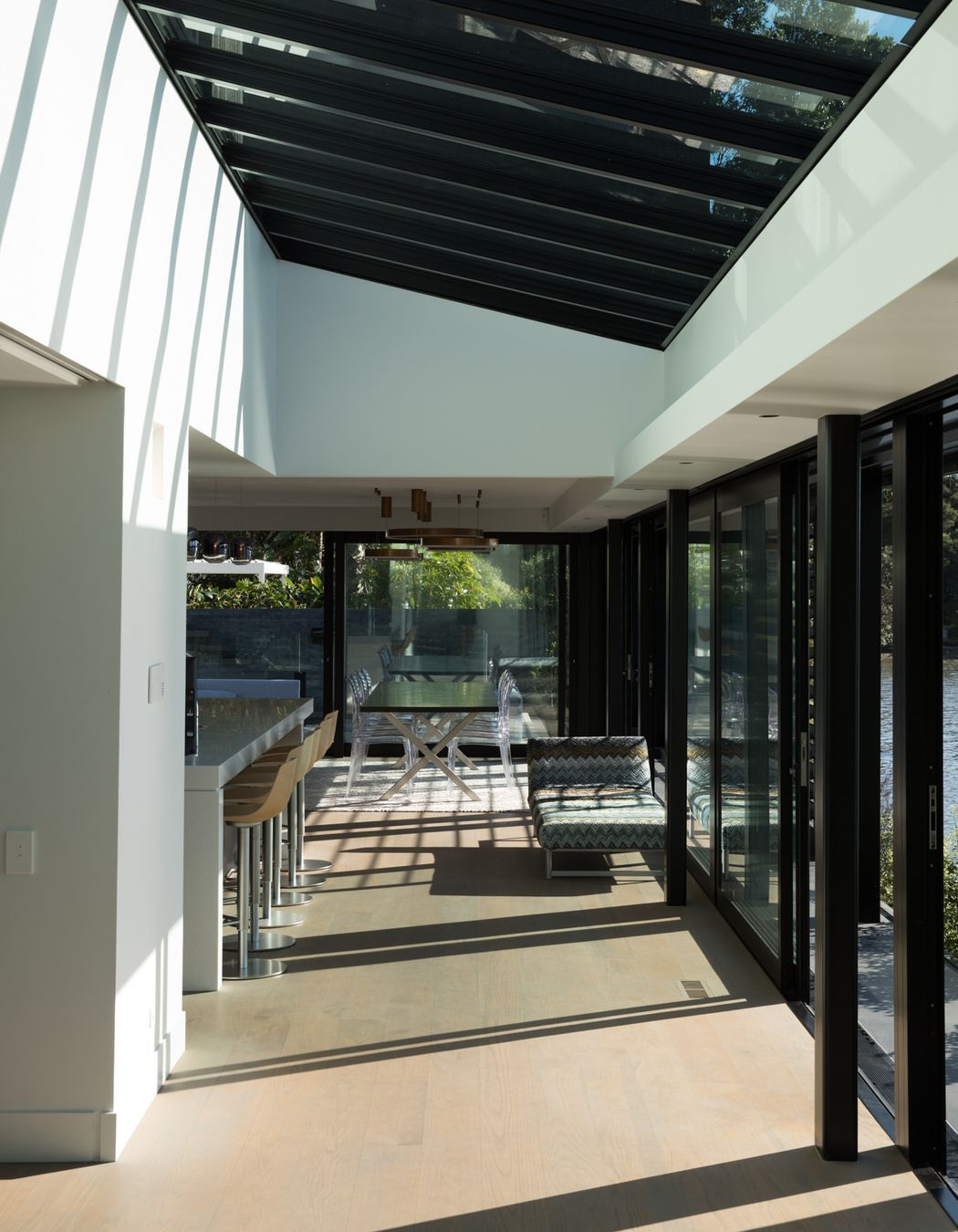 A glazed part of the roof draws light into the main kitchen/living space.