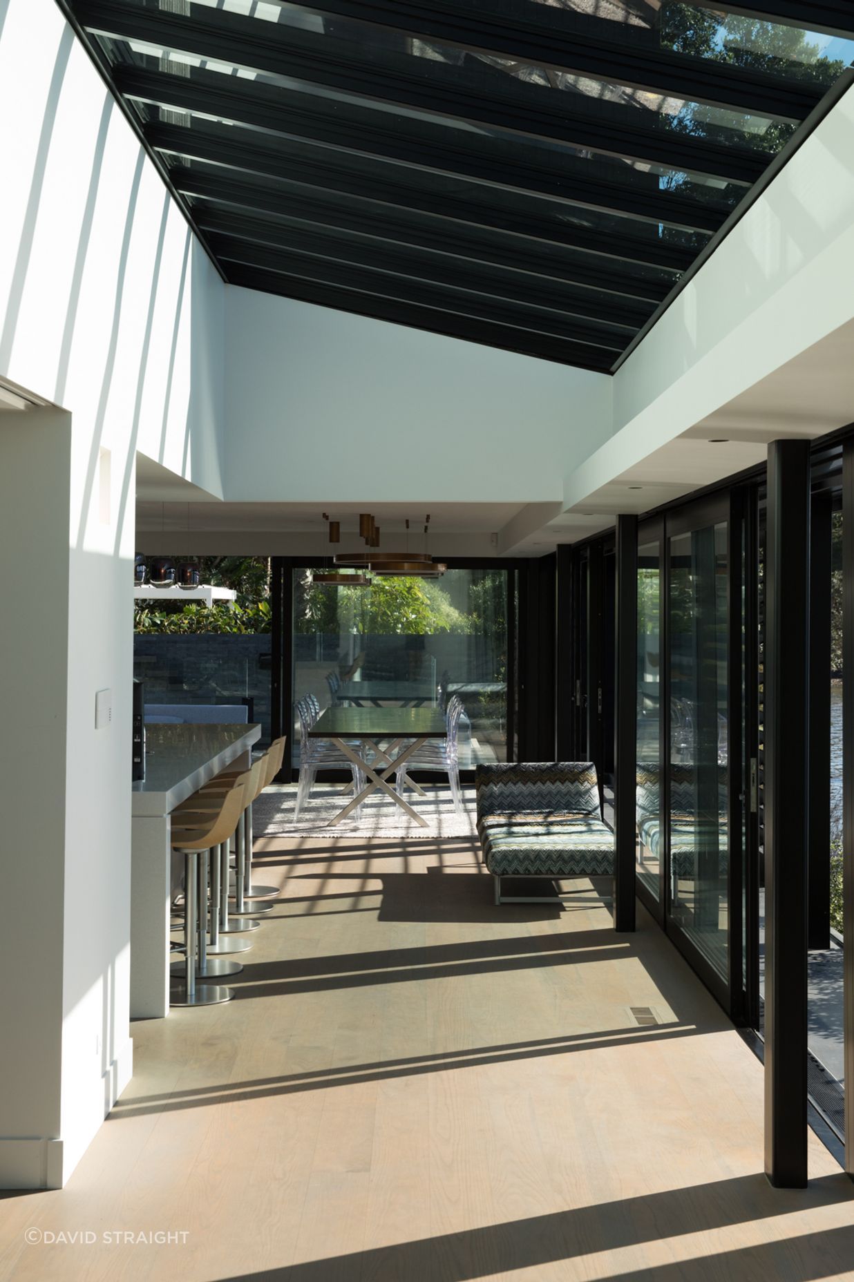 A glazed part of the roof draws light into the main kitchen/living space.