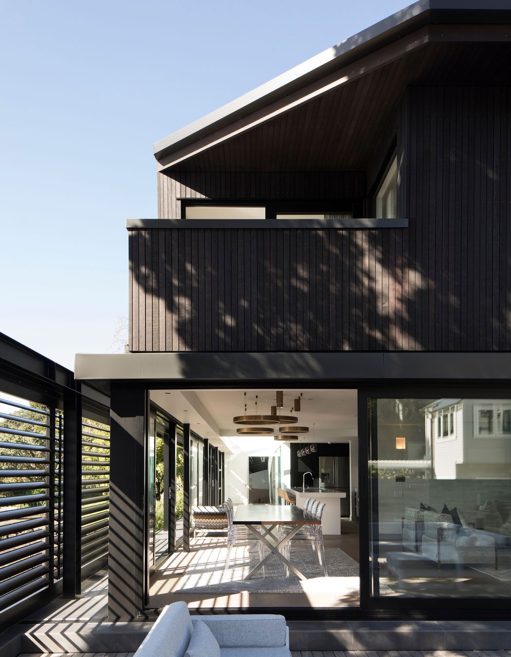 View of the main living area and, above, the master bedroom with its sheltered balcony.