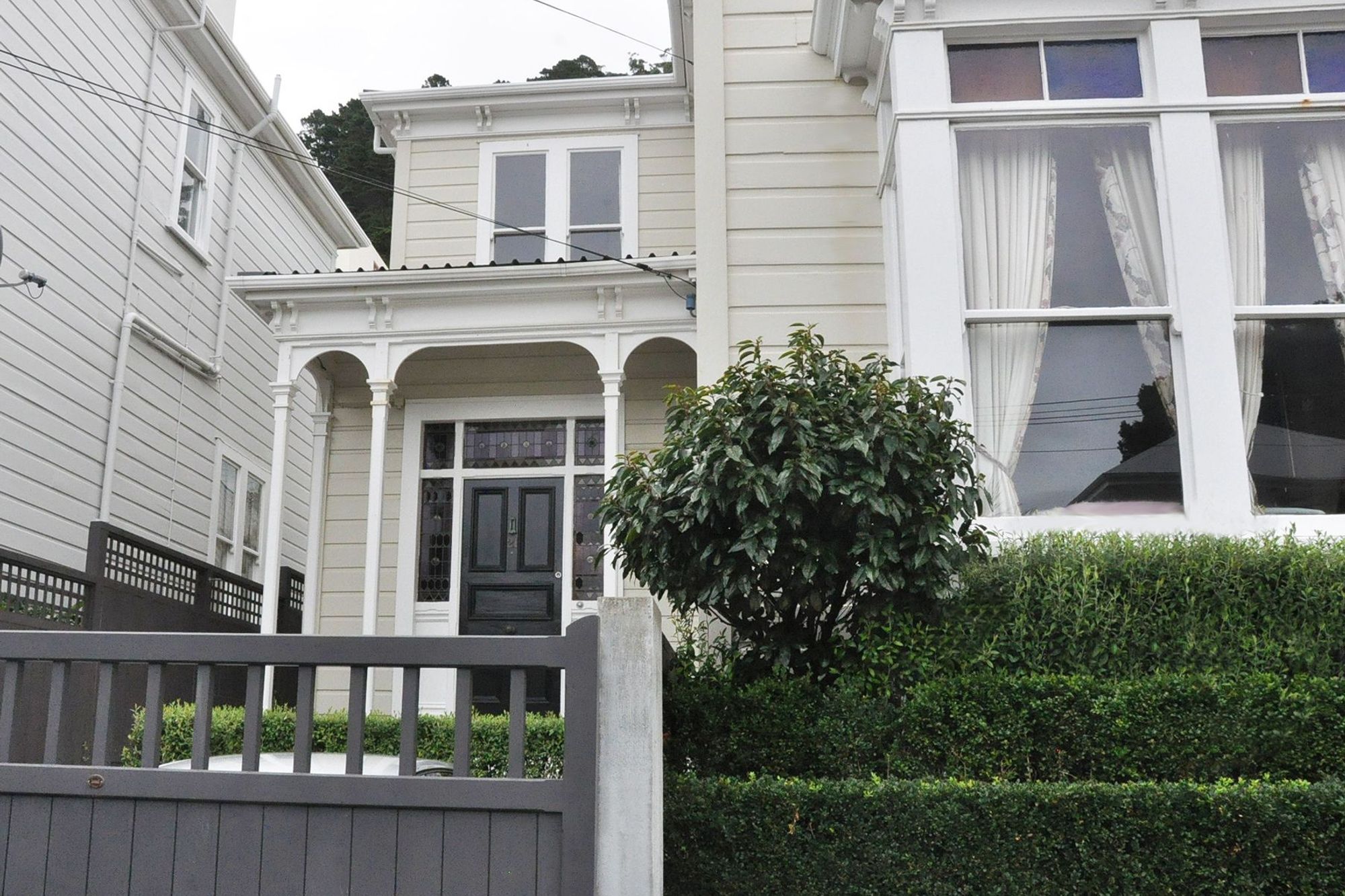 Front entrance to Thorndon house includes tiered Buxus planting