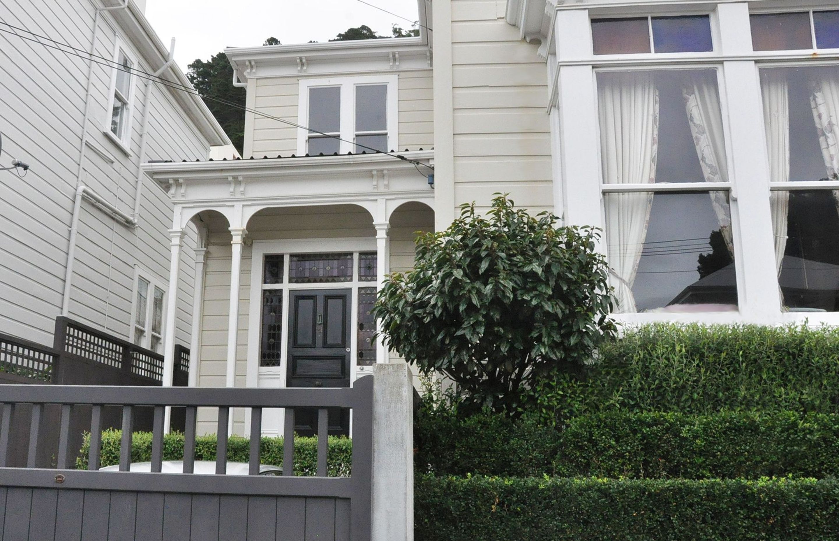 Front entrance to Thorndon house includes tiered Buxus planting