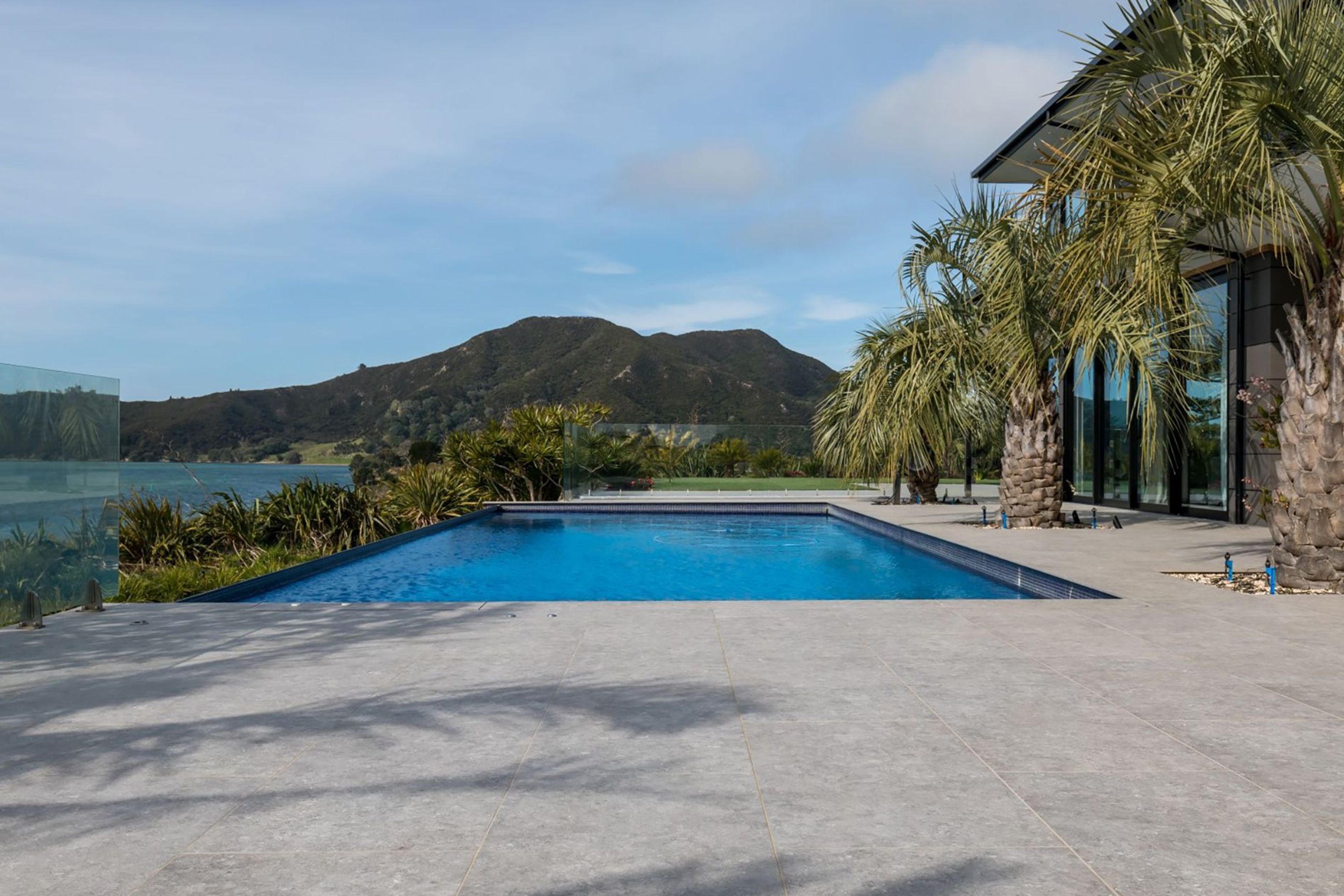 A view from the swimming pool area looking at Tohoraha (otherwise known as Mt Camel or Mt Houhora), a 236m-tall hill that Kupe mistook for a whale, according to Māori legend.