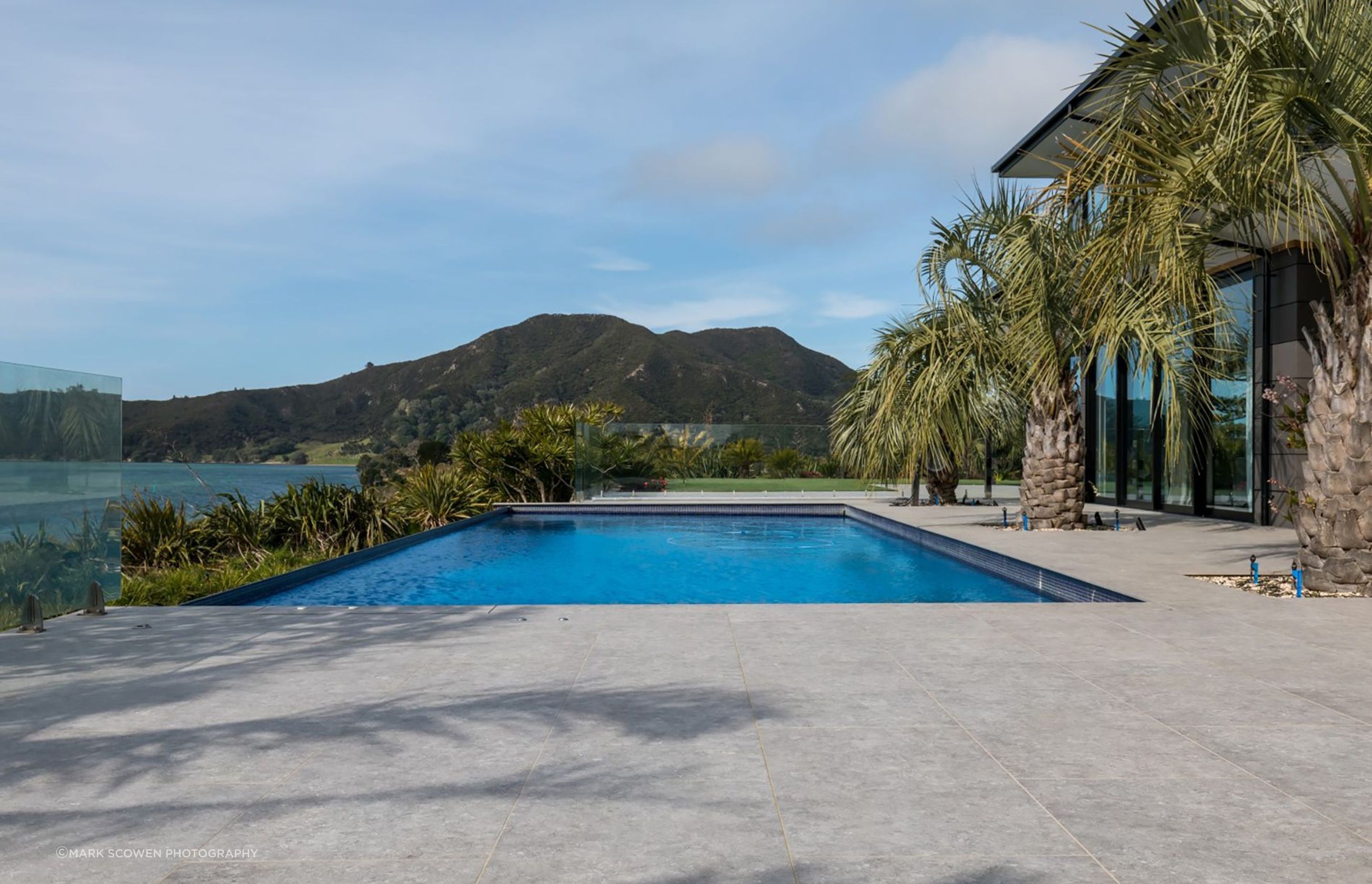 A view from the swimming pool area looking at Tohoraha (otherwise known as Mt Camel or Mt Houhora), a 236m-tall hill that Kupe mistook for a whale, according to Māori legend.