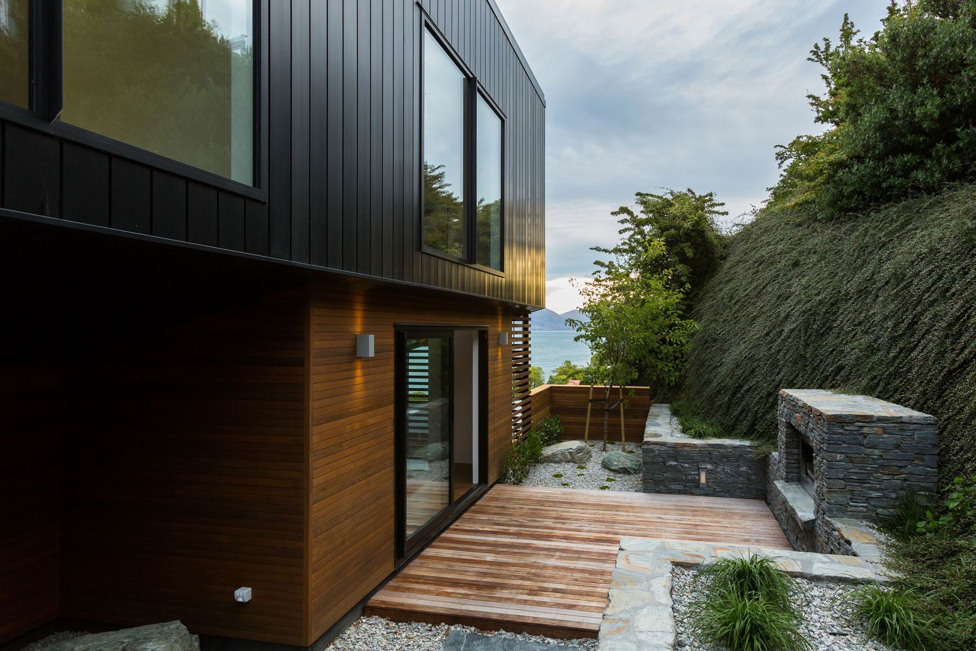 A small outdoor courtyard off the dining/living area provides a sheltered space for enjoying the outdoors.
