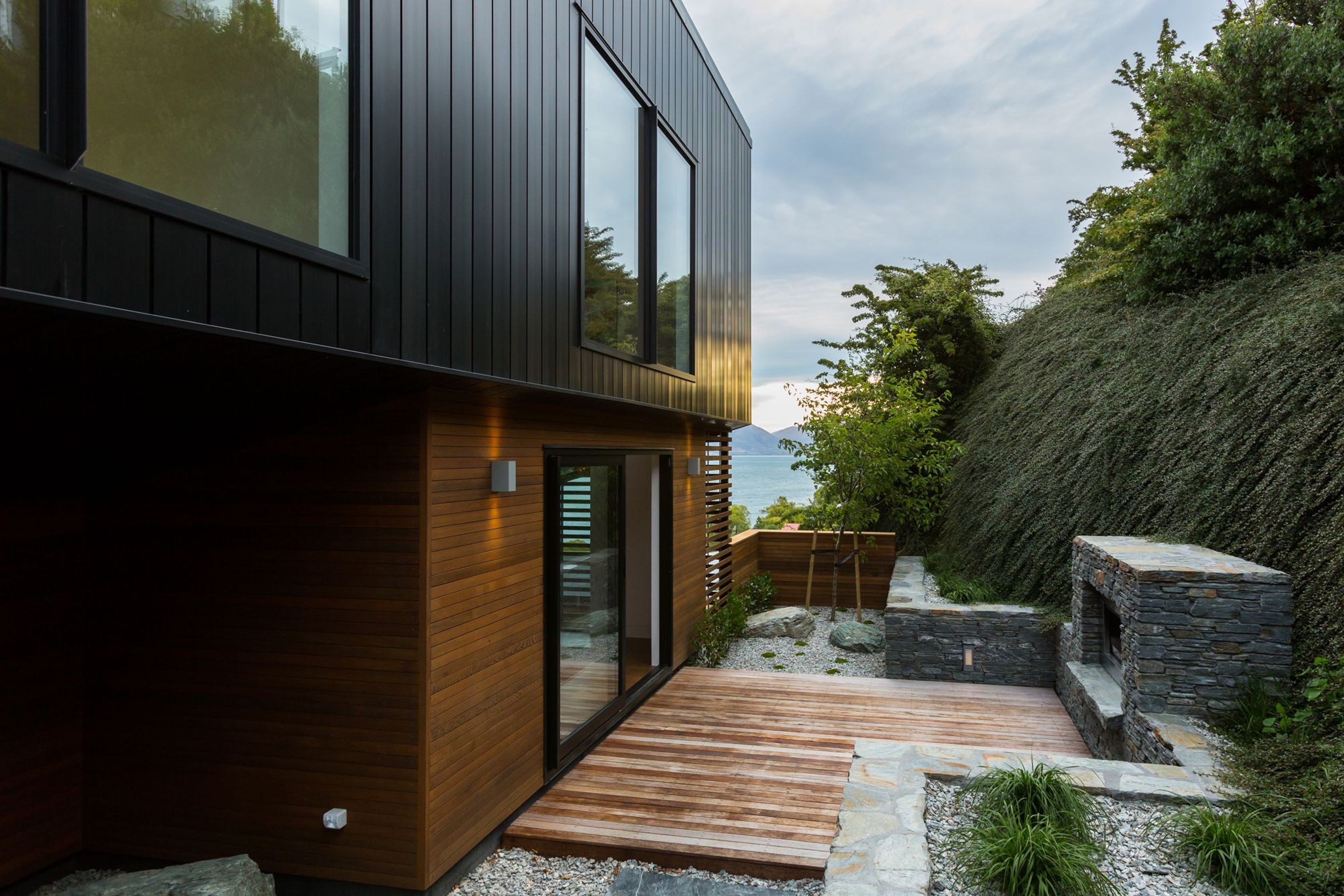 A small outdoor courtyard off the dining/living area provides a sheltered space for enjoying the outdoors.