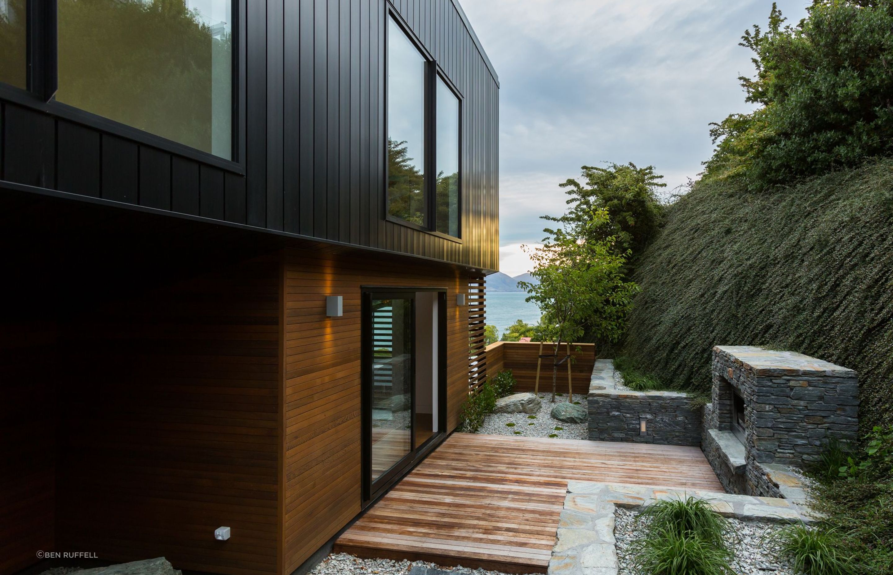 A small outdoor courtyard off the dining/living area provides a sheltered space for enjoying the outdoors.