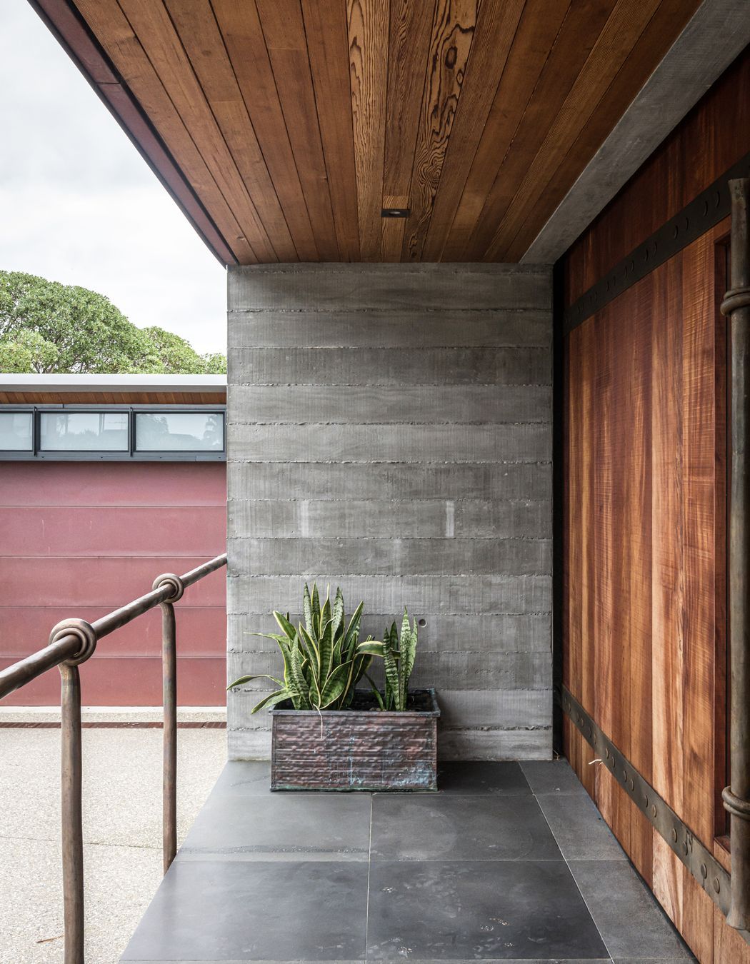 Enter through a huge timber barn door with handcrafted metal hardware. 