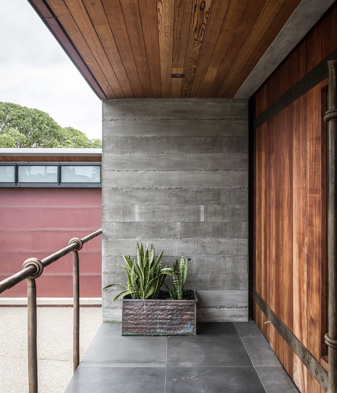 Enter through a huge timber barn door with handcrafted metal hardware. 