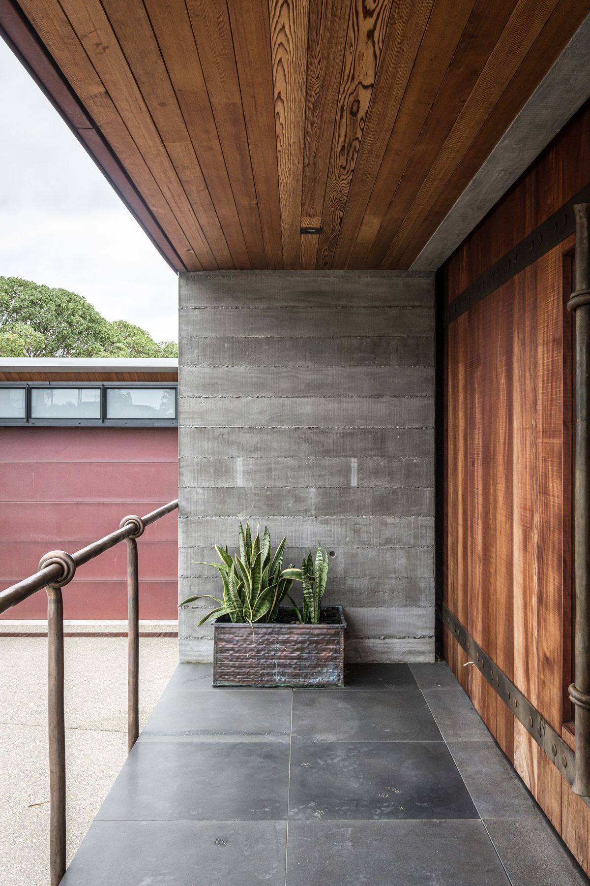 Enter through a huge timber barn door with handcrafted metal hardware.