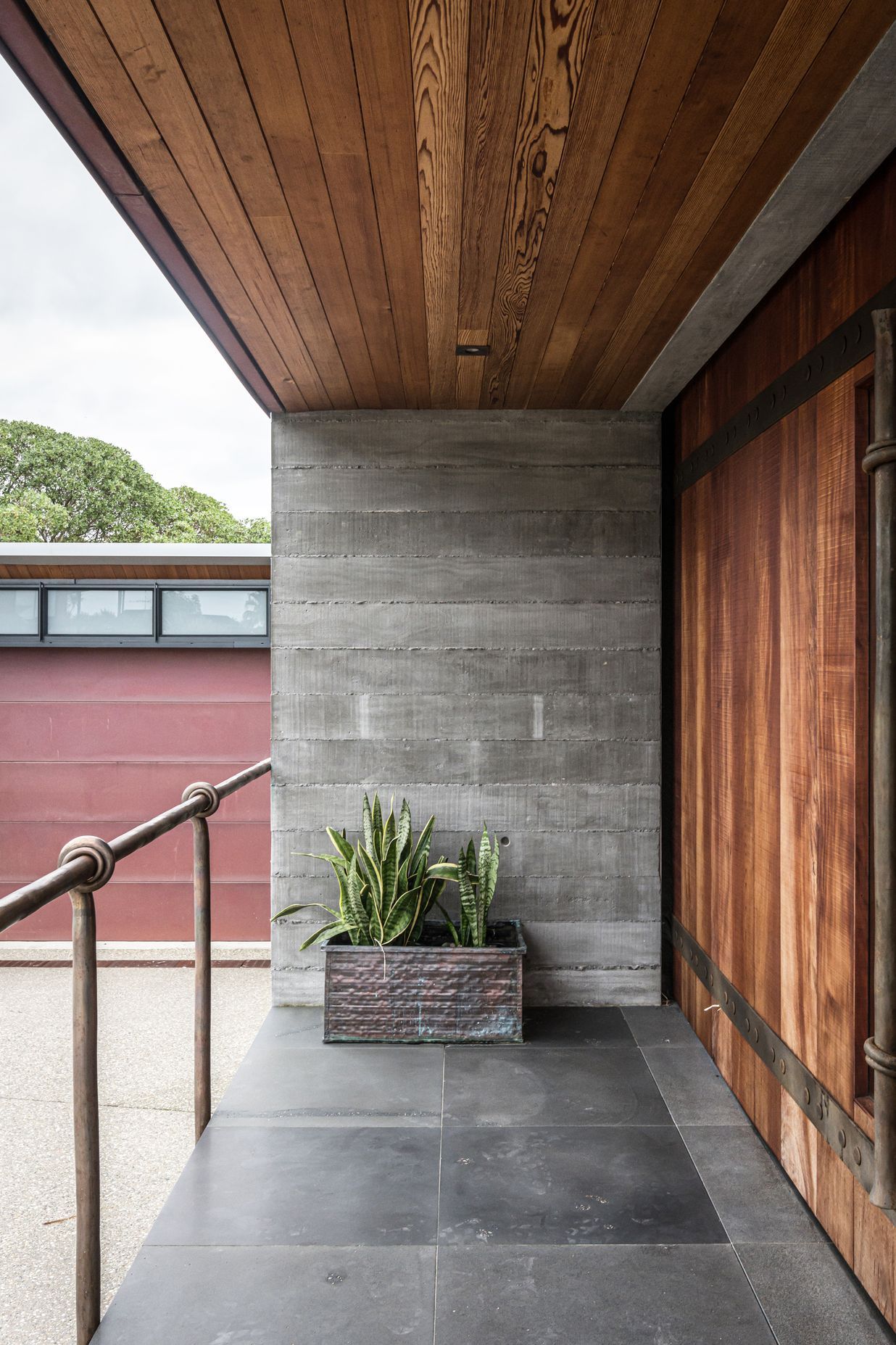 Enter through a huge timber barn door with handcrafted metal hardware. 