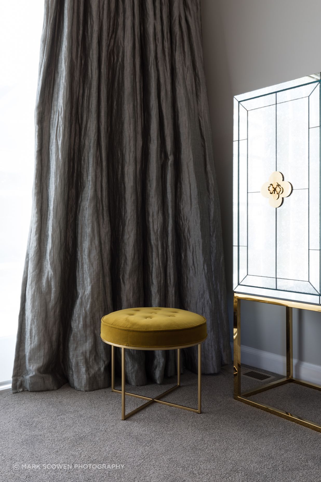 Whichever angle you are looking from the antiqued mirror glass always looks different