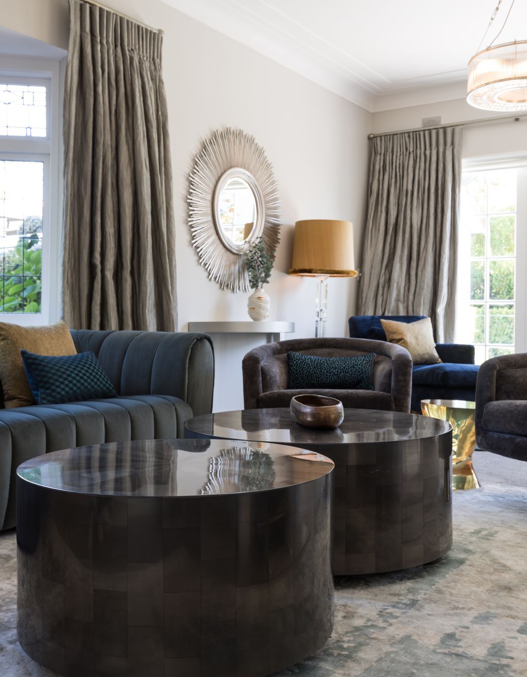 A rug of silver and teal