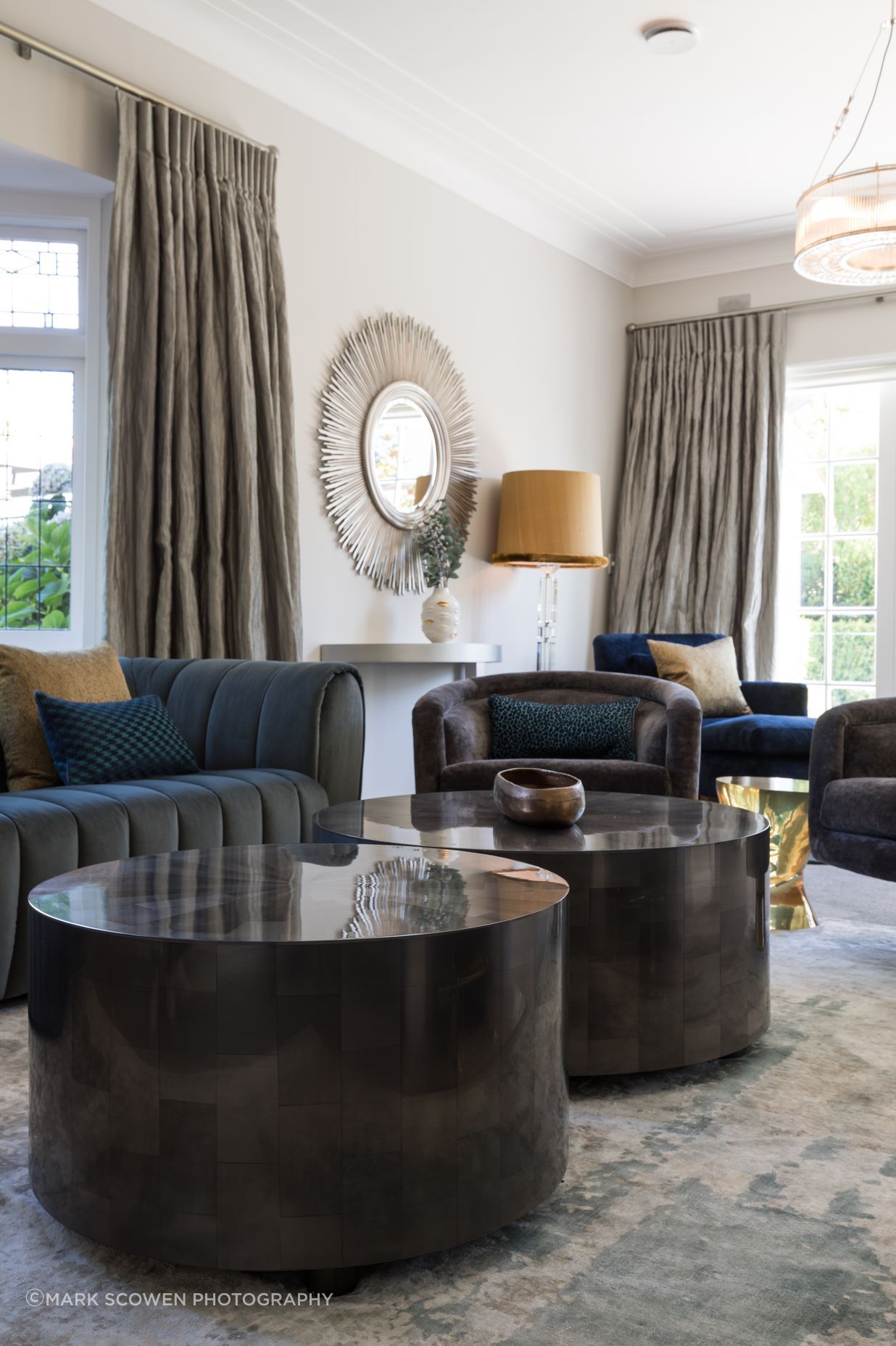 A rug of silver and teal
