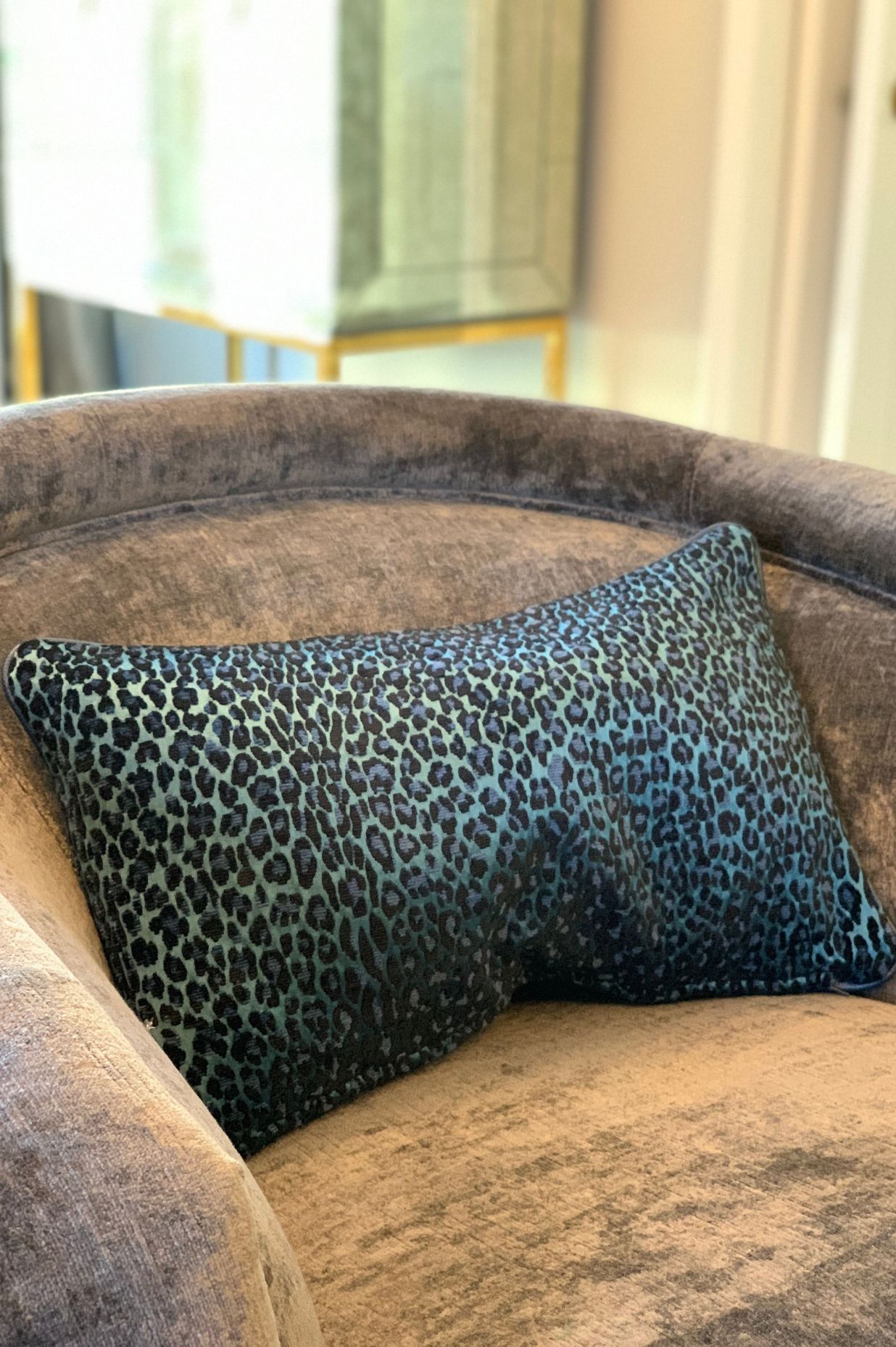 Leopard skin in shades of blue with leather trim