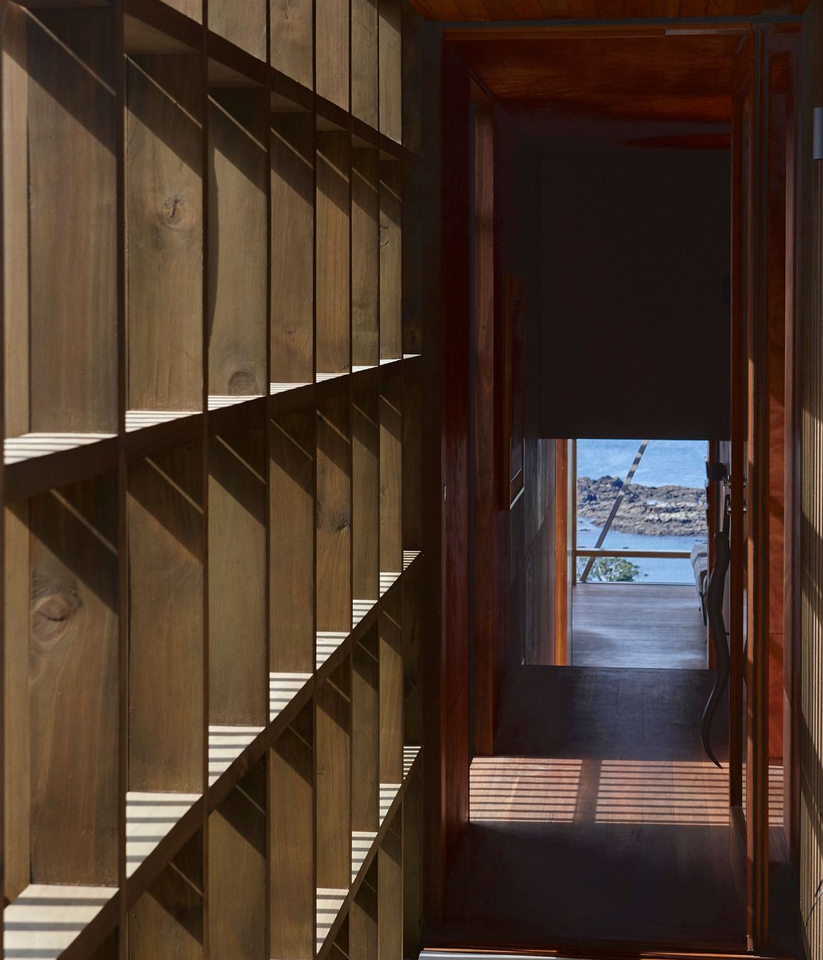 Rainscreens provide protection and daplled light into the covered walkway.