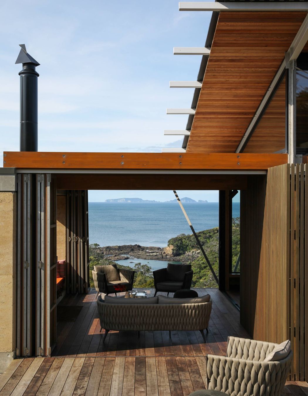 The outdoor room looks straight out over the islands. Photograph by Jackie Meiring.