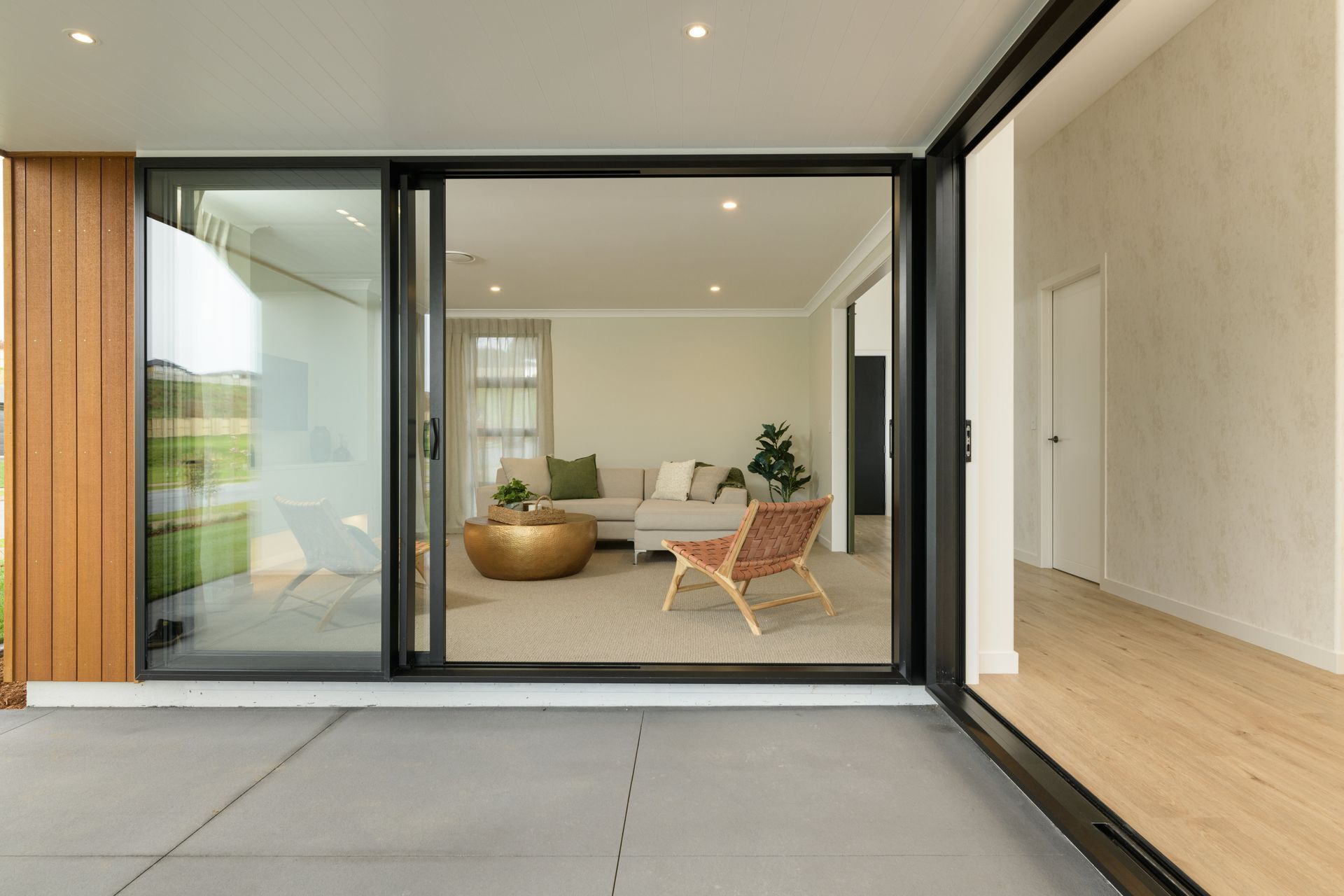 Double sliders connecting open plan spaces to outdoor entertainment area