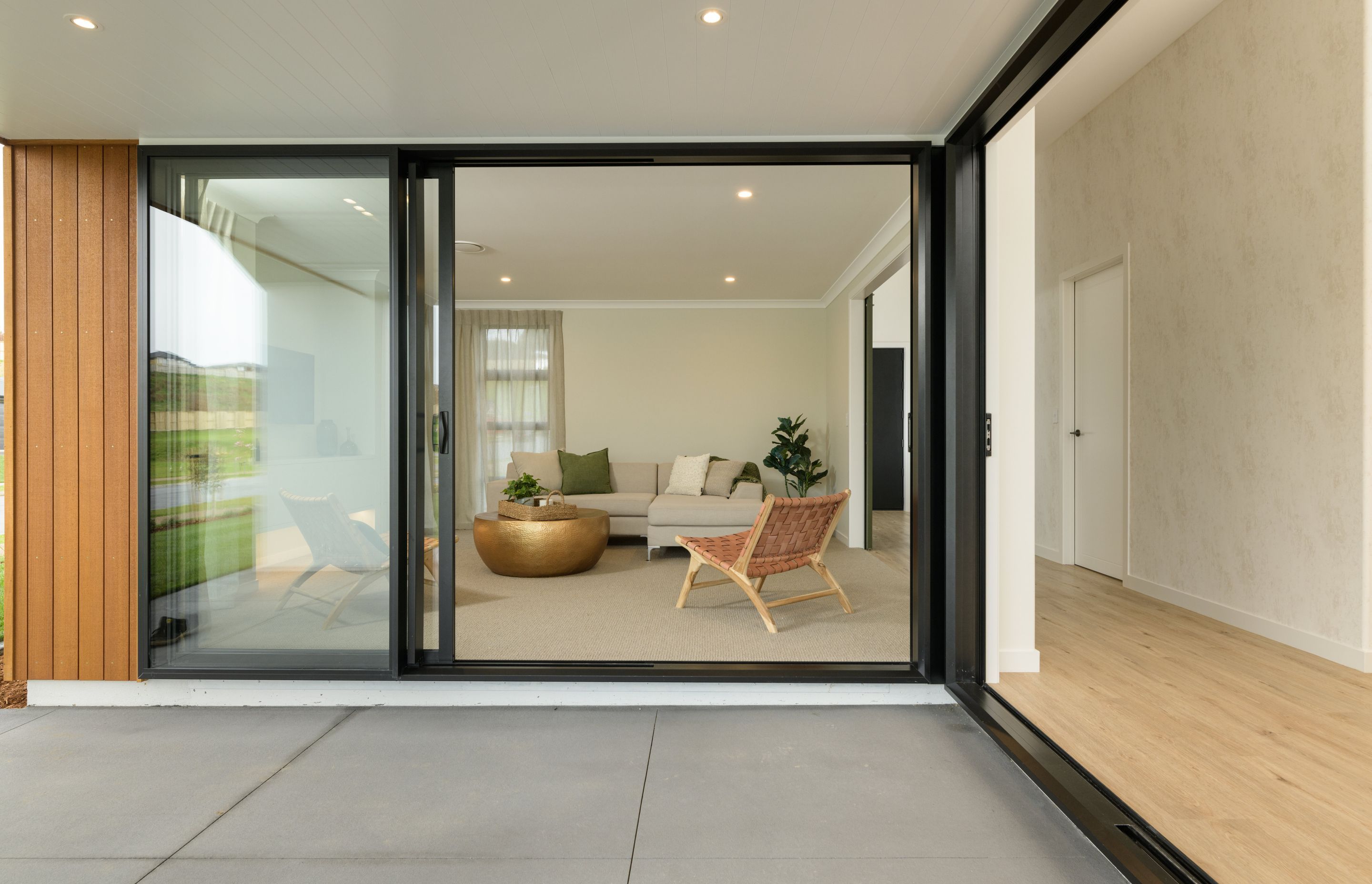Double sliders connecting open plan spaces to outdoor entertainment area