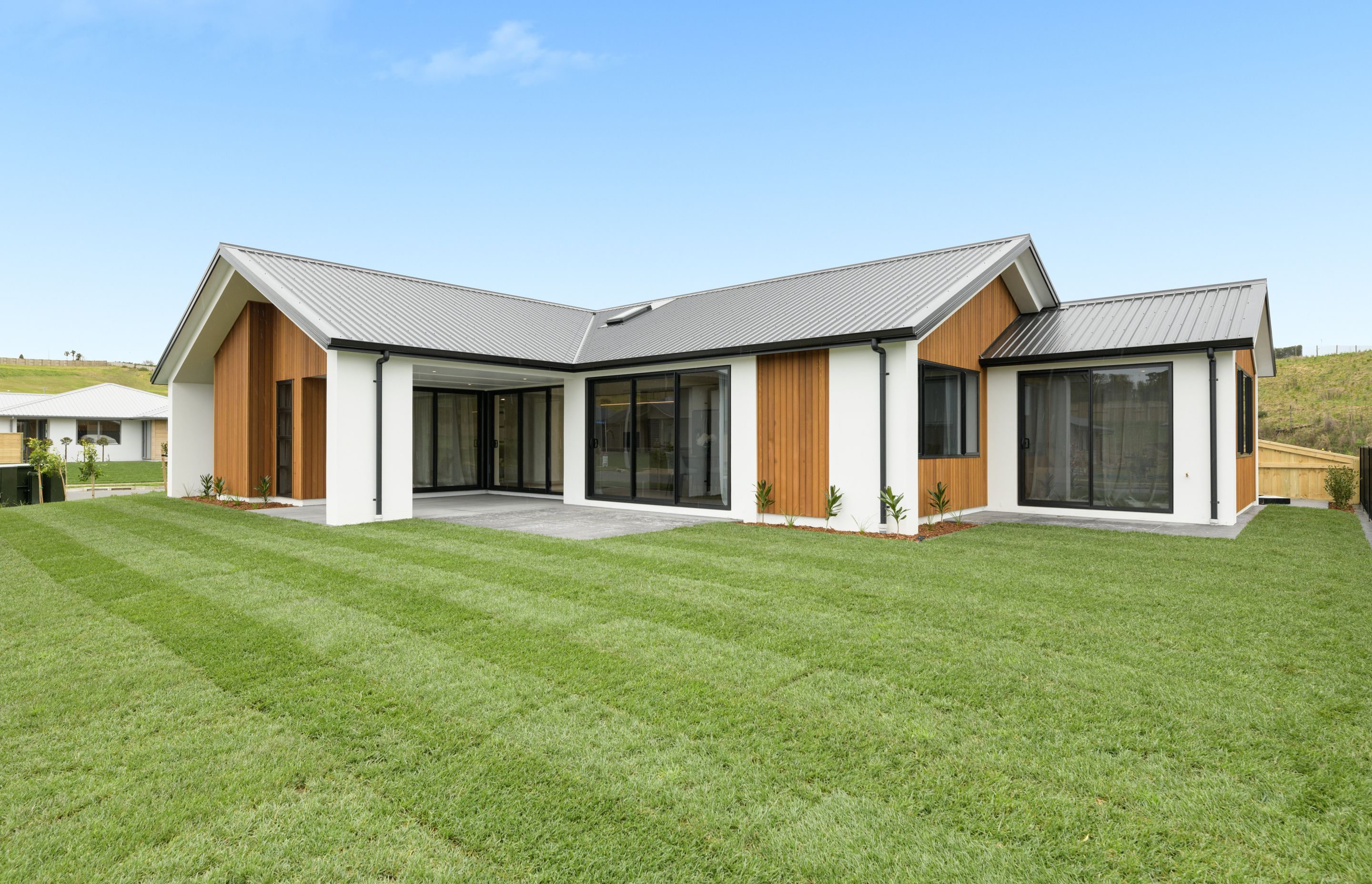 Show home exterior Shiplap Cedar and Celcrete cladding 