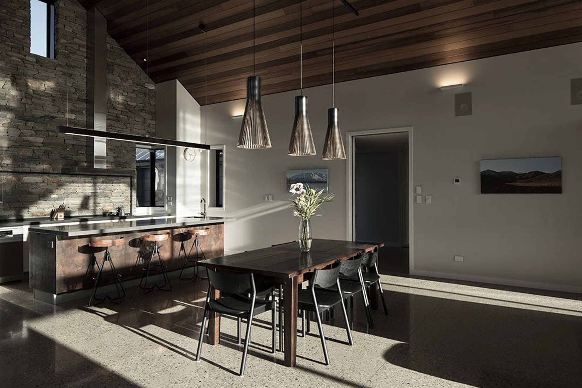 The owners requested something understated, so the material and colour palettes have been kept fairly minimal with materials doing double duty both outdoors and in.