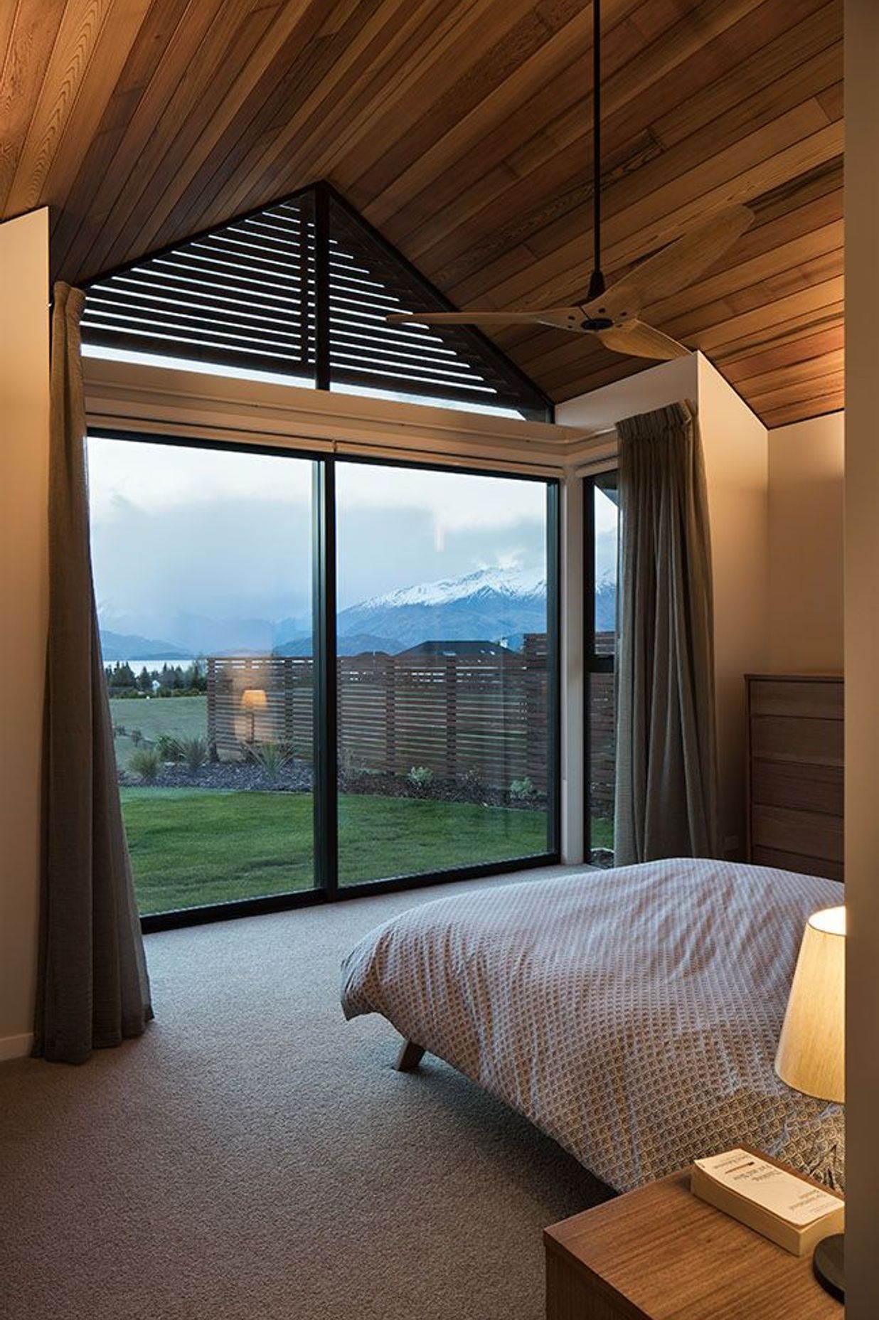 Floor-to-ceiling glazing allows for the view to be front and centre in this bedroom suite.