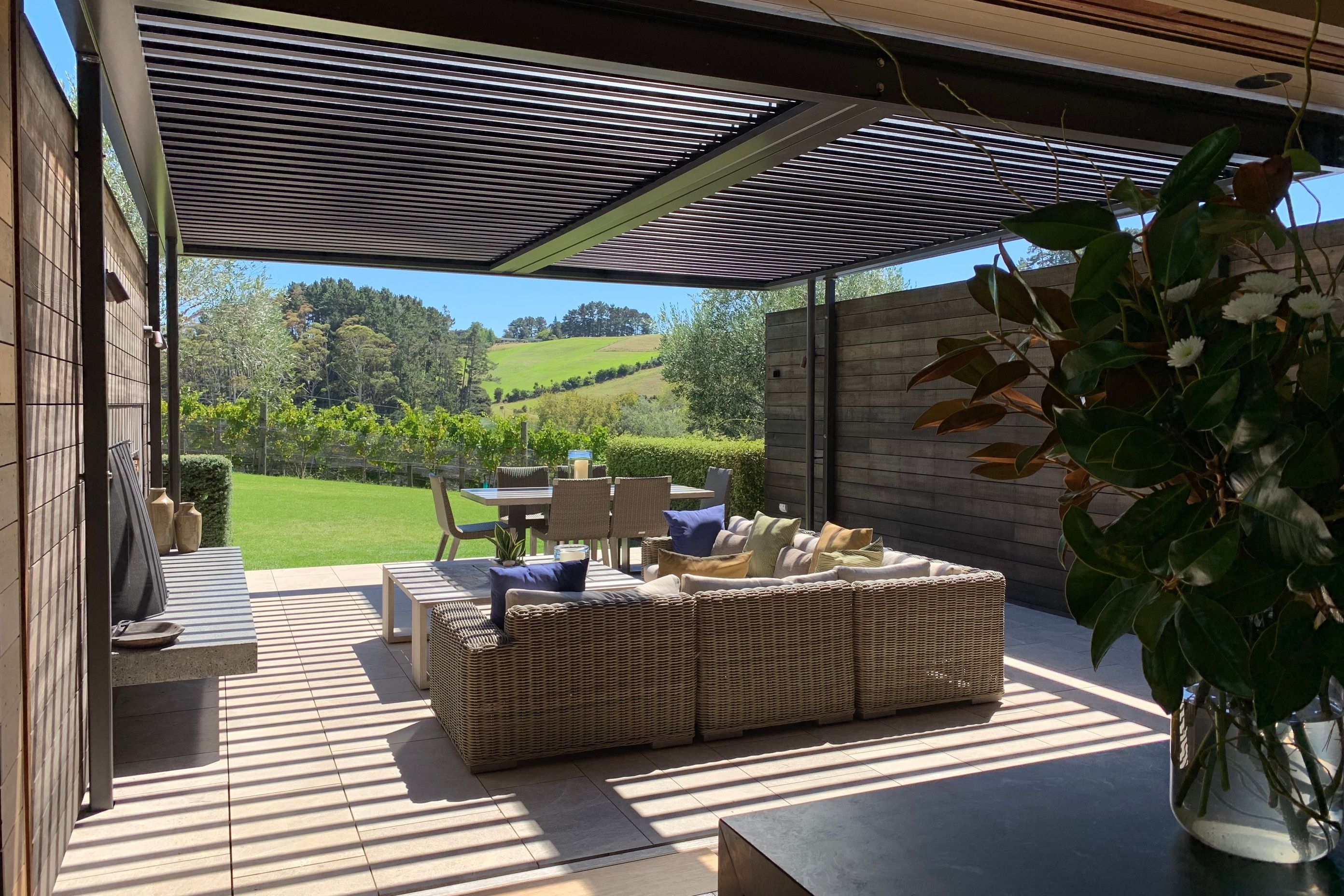Filtered light floods the sheltered outdoor courtyard