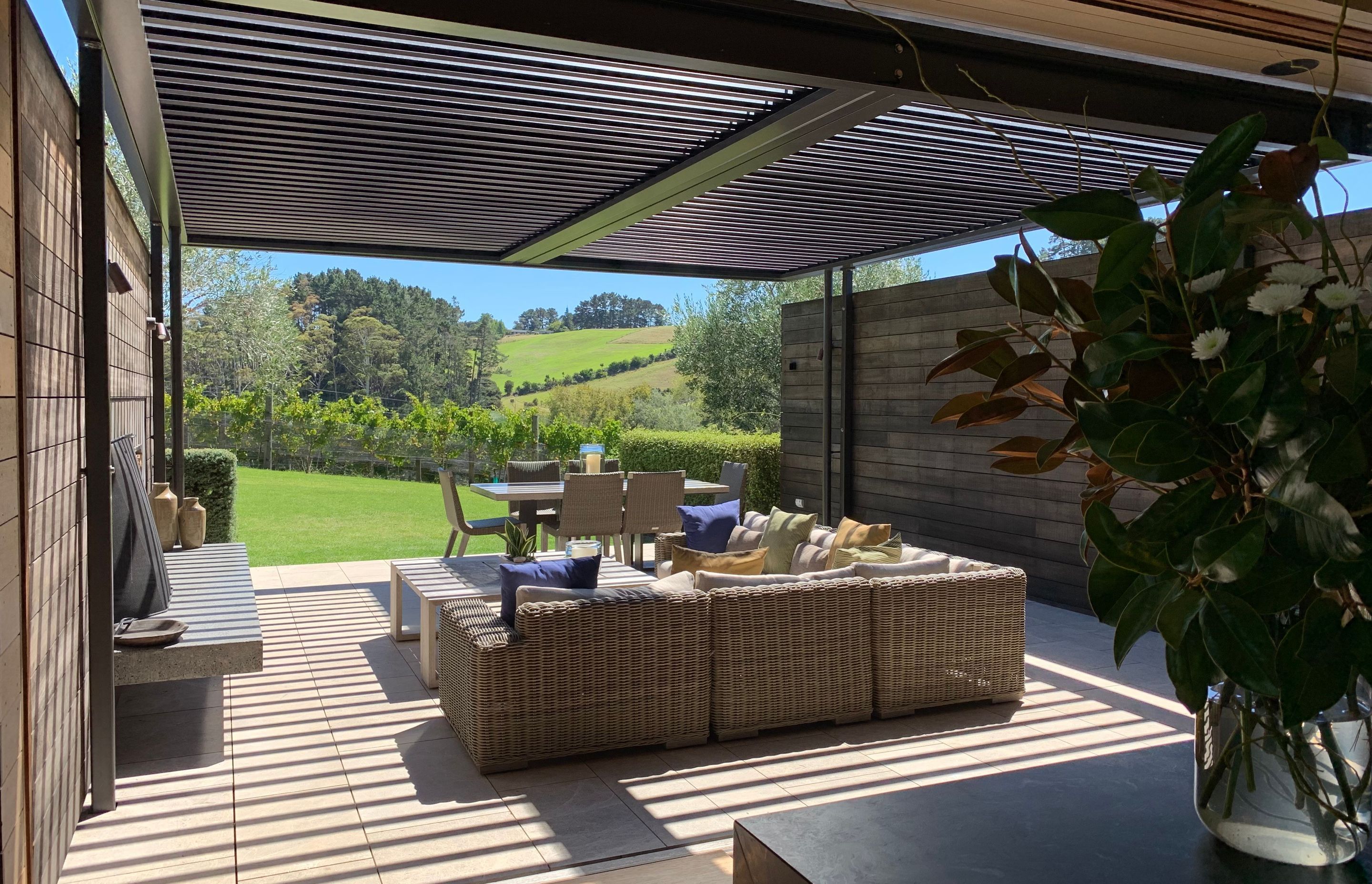 Filtered light floods the sheltered outdoor courtyard