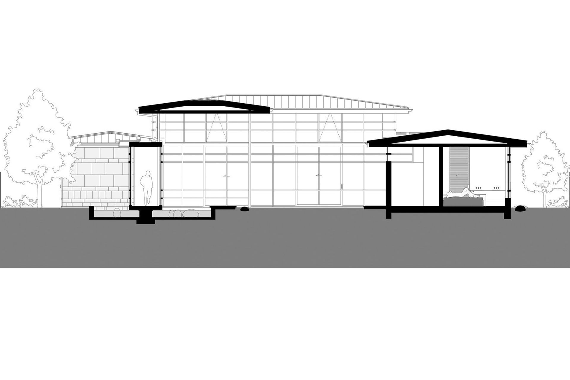 A section or slice-through of the house showing the entrance corridor on the right, across the courtyard and the master bedroom on the right side; by RB Studio.