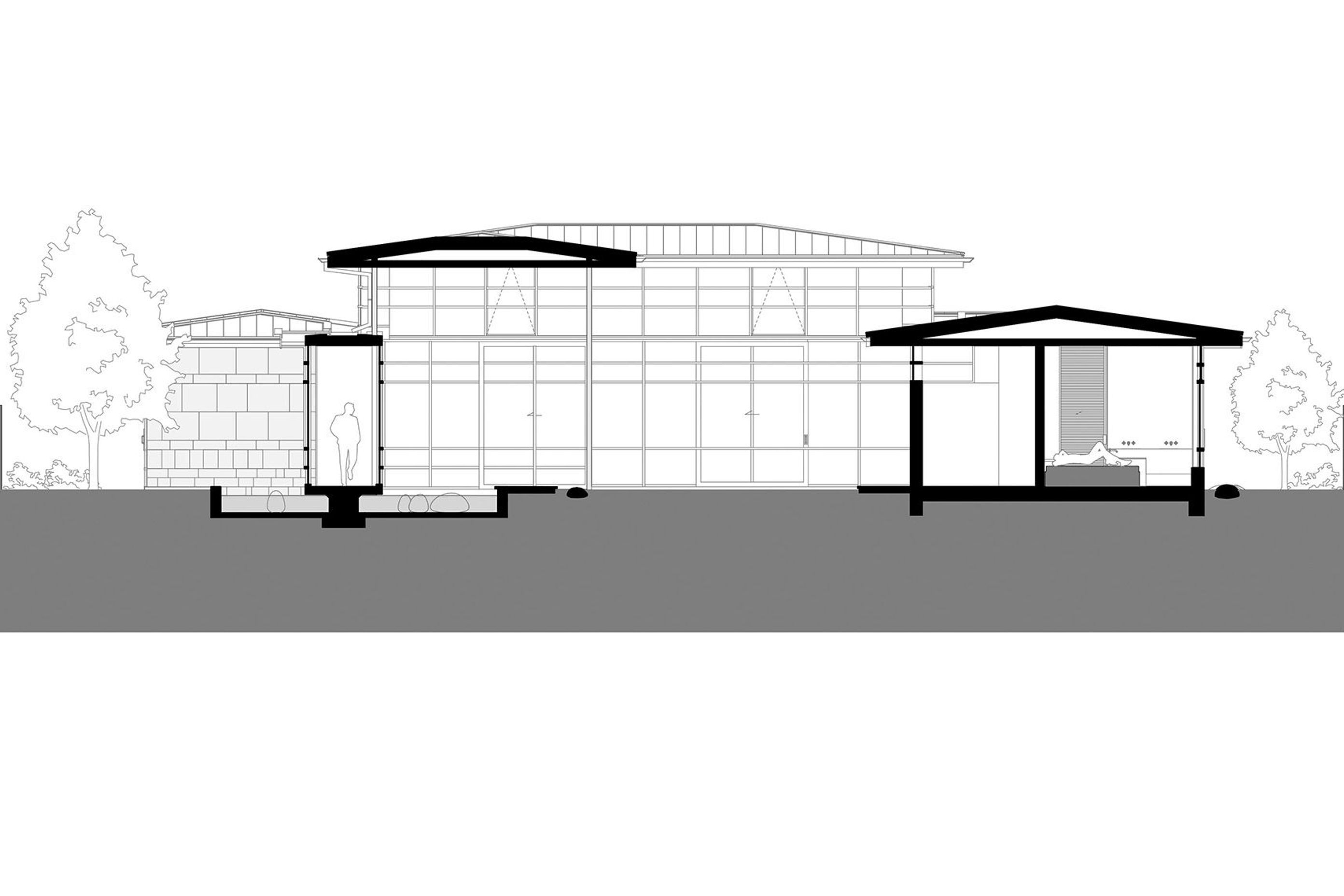 A section or slice-through of the house showing the entrance corridor on the right, across the courtyard and the master bedroom on the right side; by RB Studio.