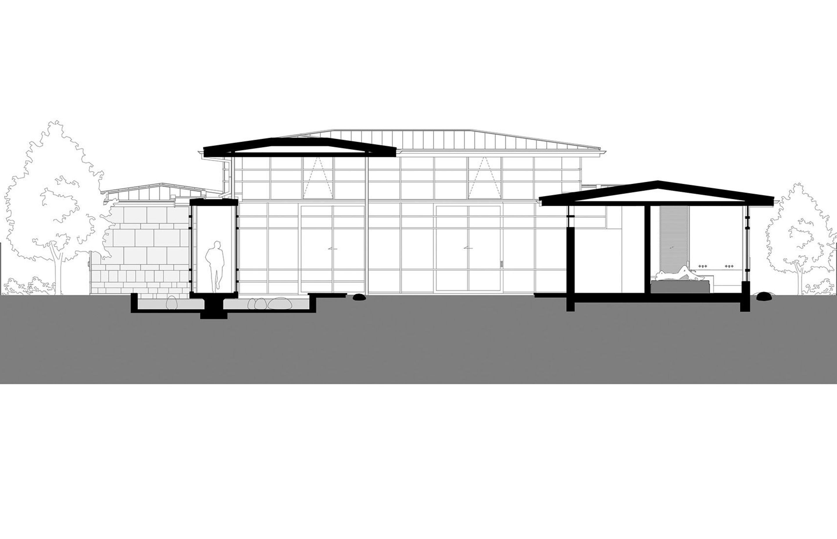 A section or slice-through of the house showing the entrance corridor on the right, across the courtyard and the master bedroom on the right side; by RB Studio.