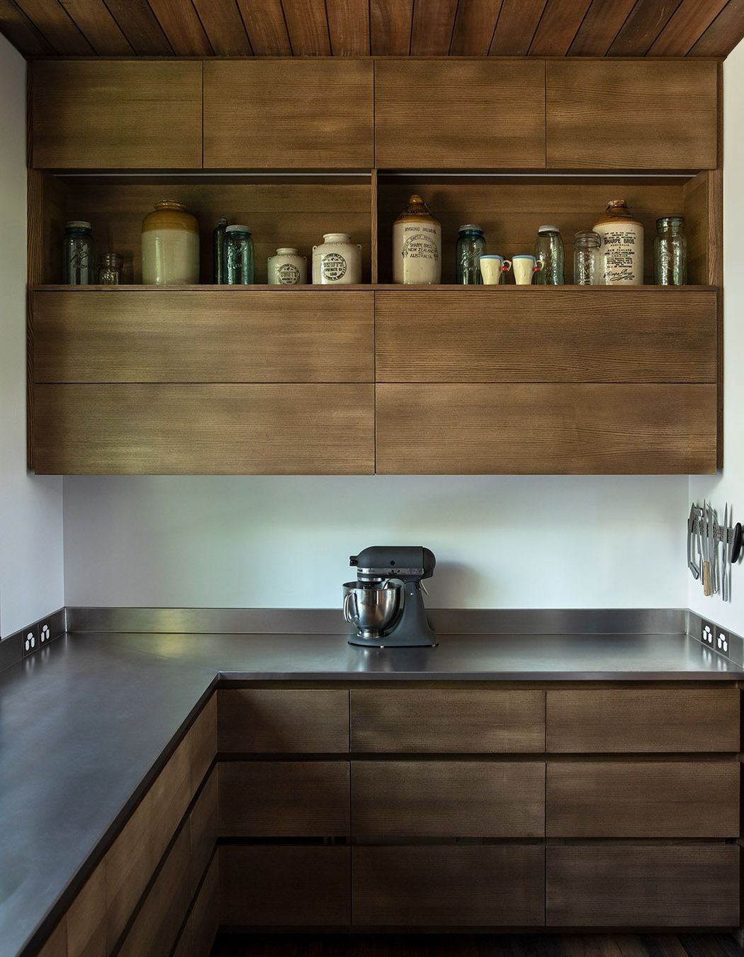 The scullery features plenty of bench space and bespoke built-in cabinetry.