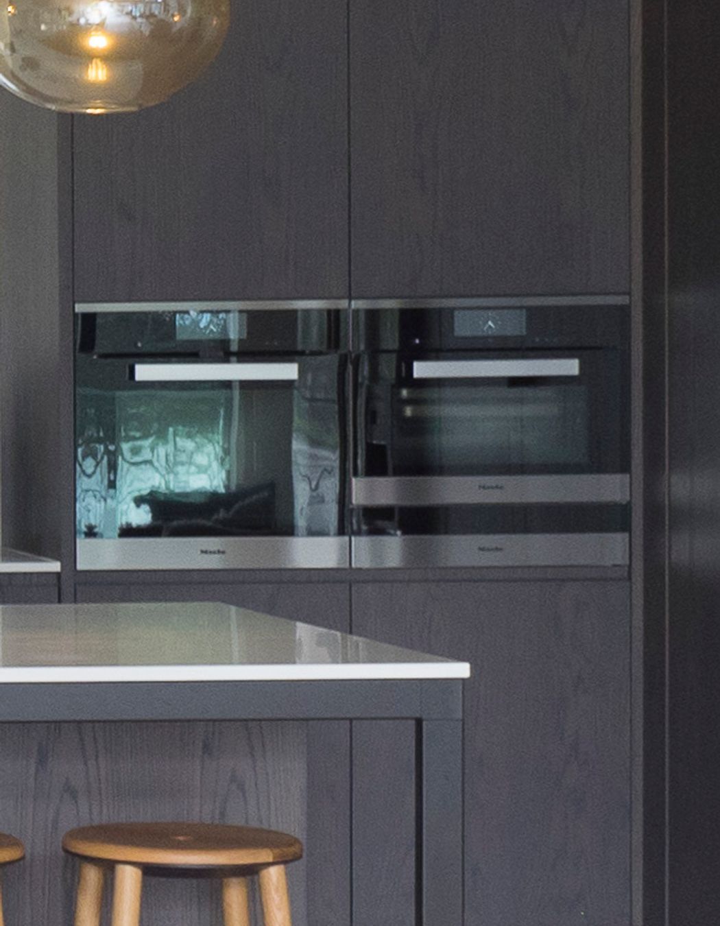 We were excited to see that the water view is reflected in the glass of the ovens.