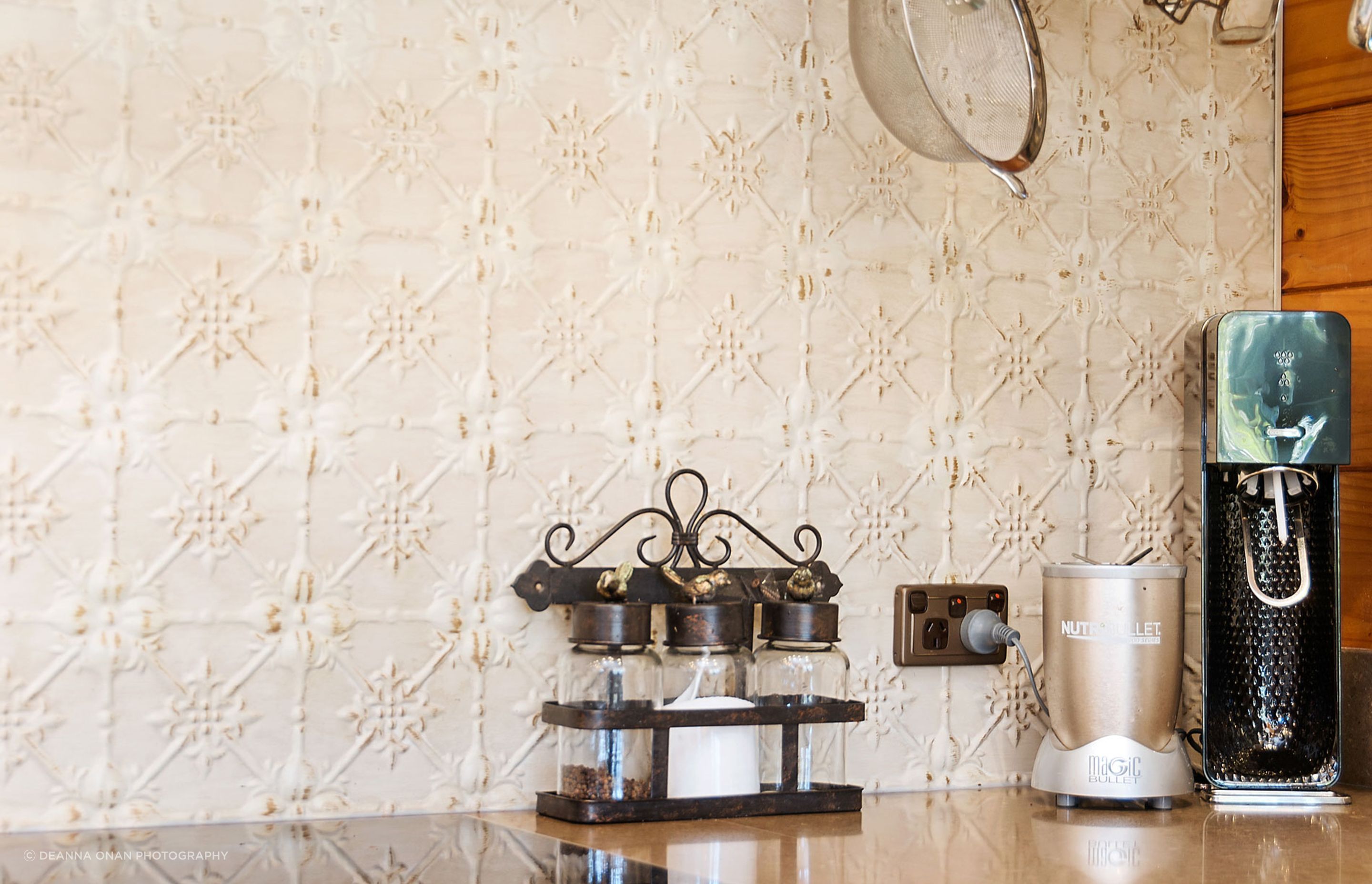 pressed tin splash back with distressed paint finish