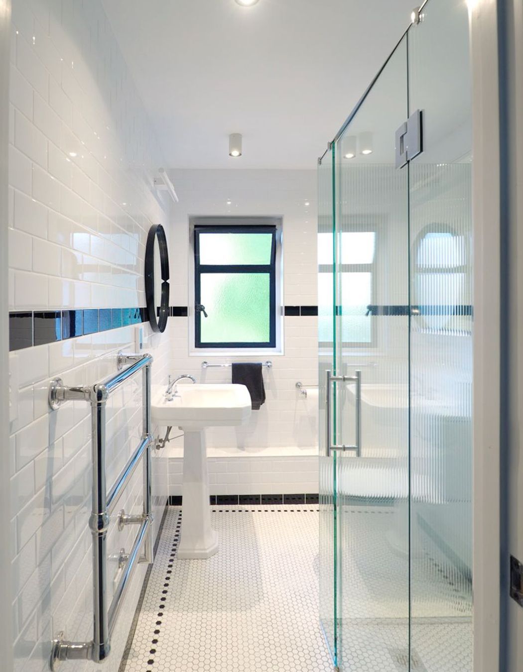 All the bathrooms fittings are a nod the the buildings history.