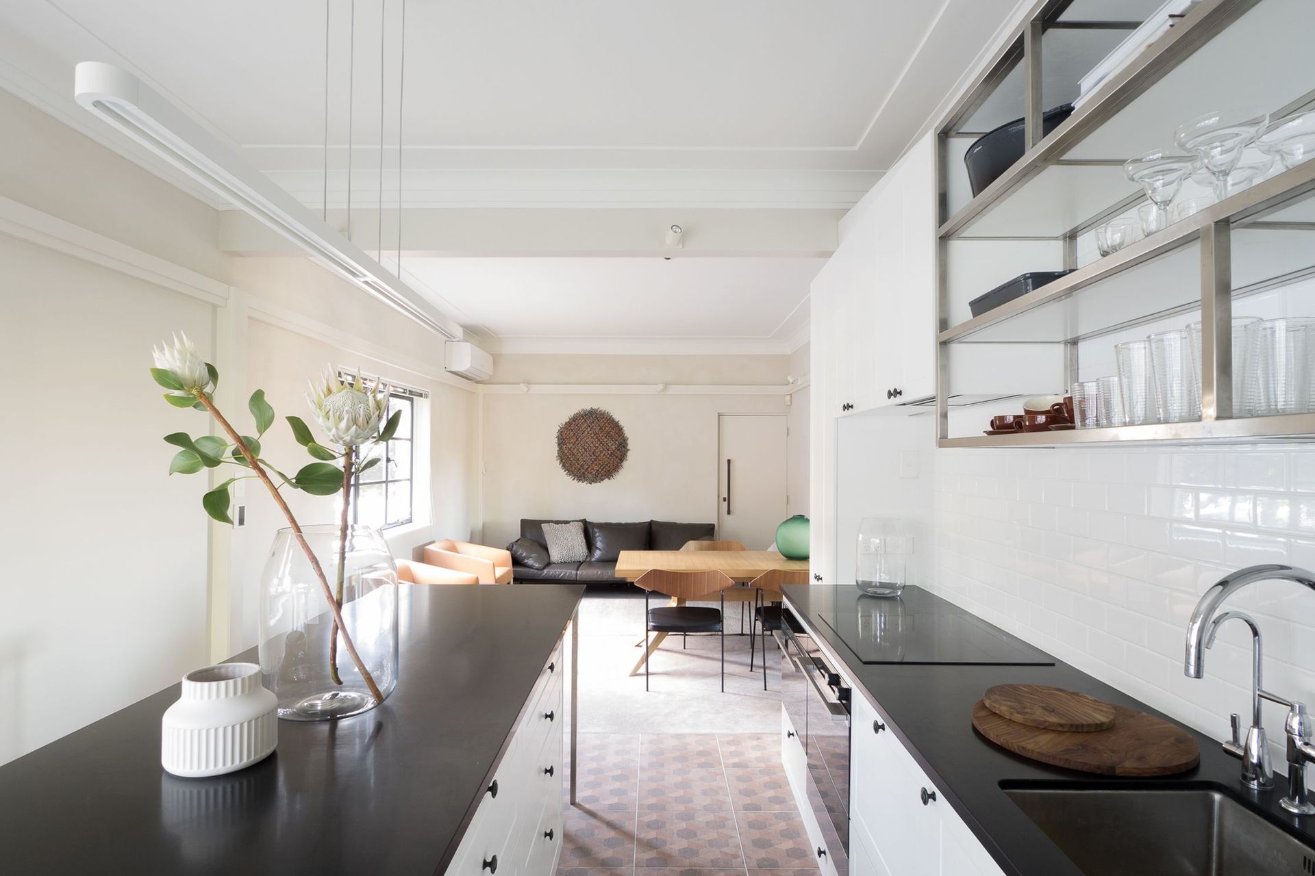 The kitchen whilst stand alone is connected to the meeting space.