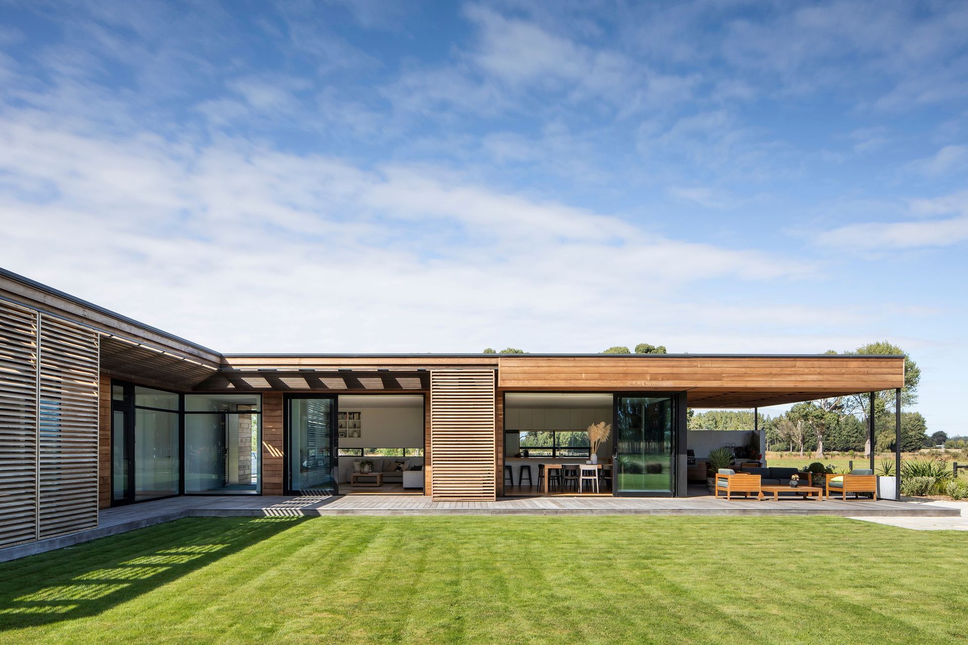 A large north-facing lawn provides plenty of space for young children to safely run around and play outside in view of the parents.