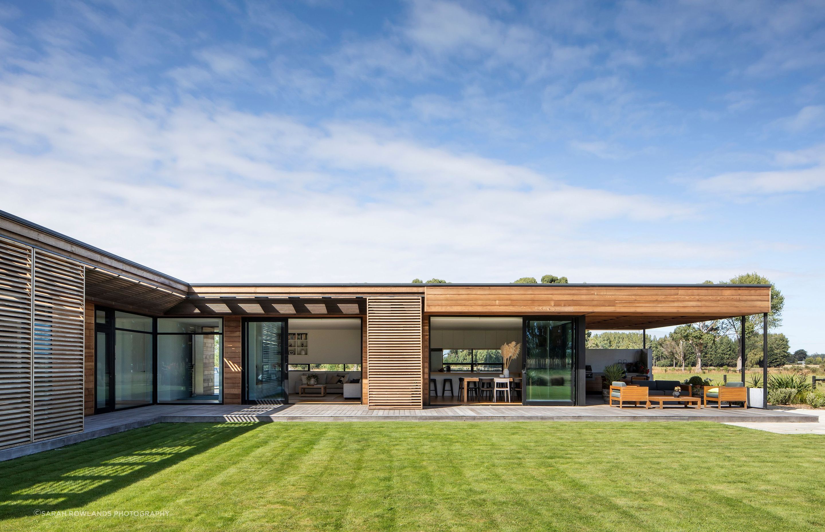 A large north-facing lawn provides plenty of space for young children to safely run around and play outside in view of the parents.