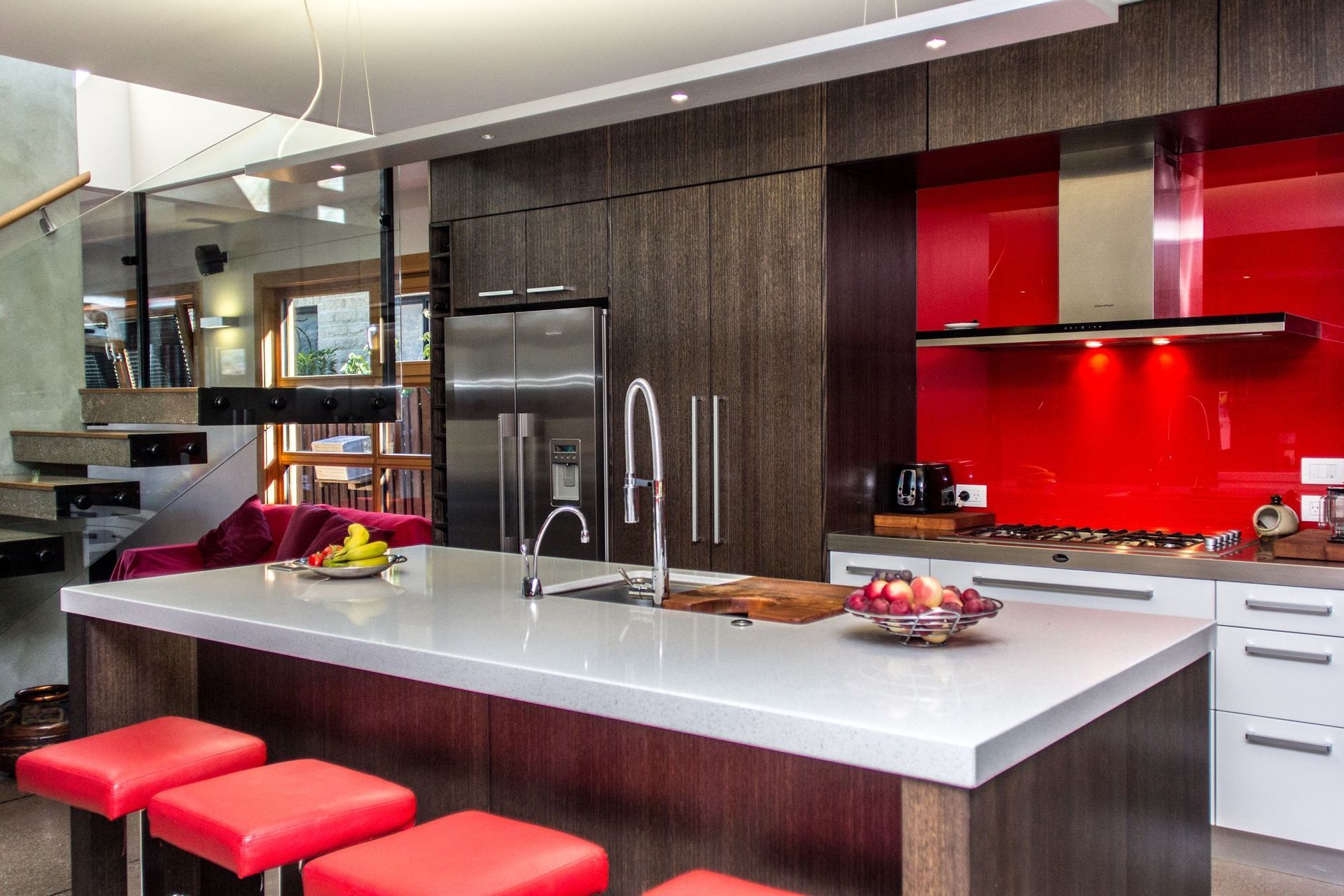 The bright colours of the kitchen add contrast and interest.