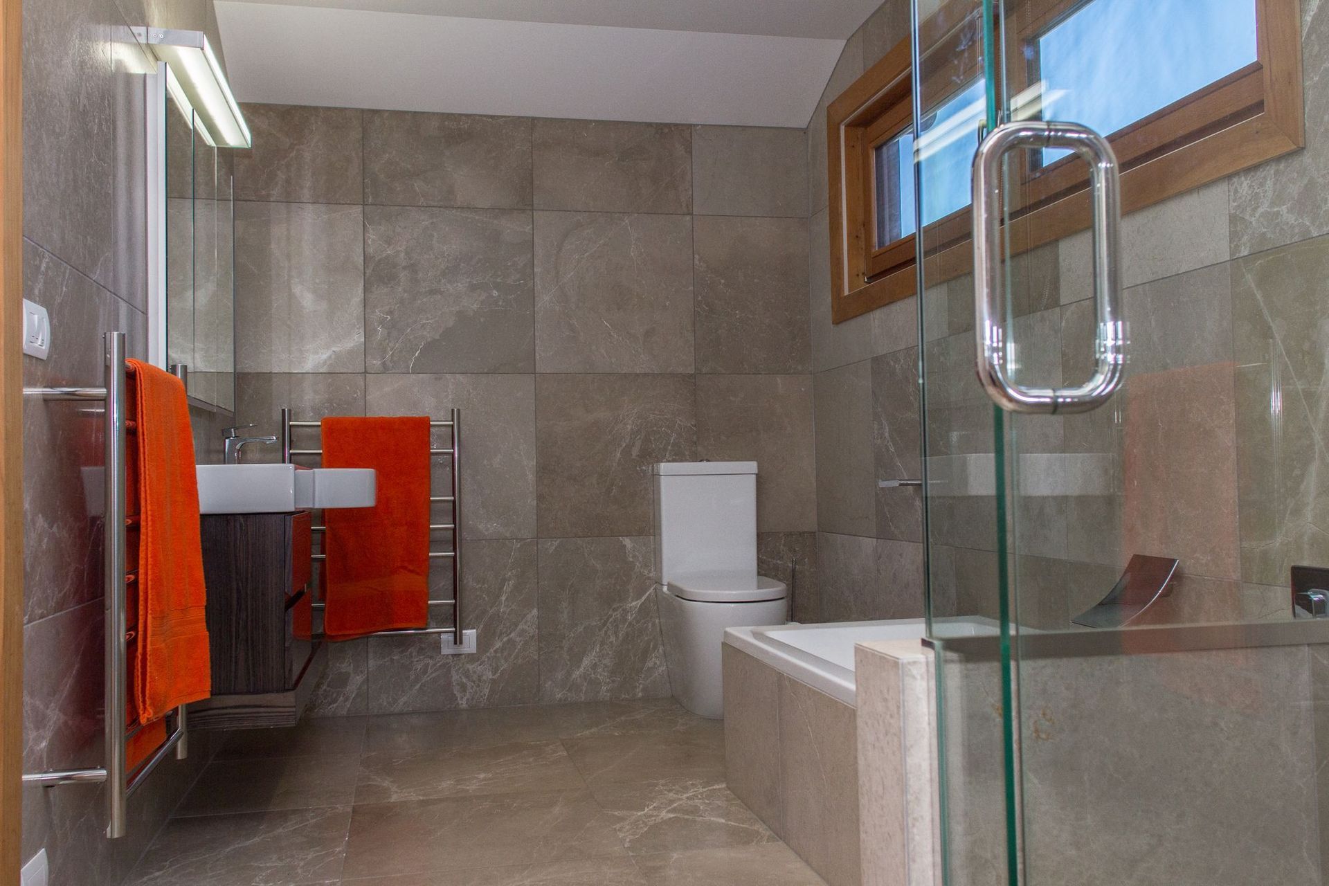 Well appointed bathrooms enhance the quality of the home.